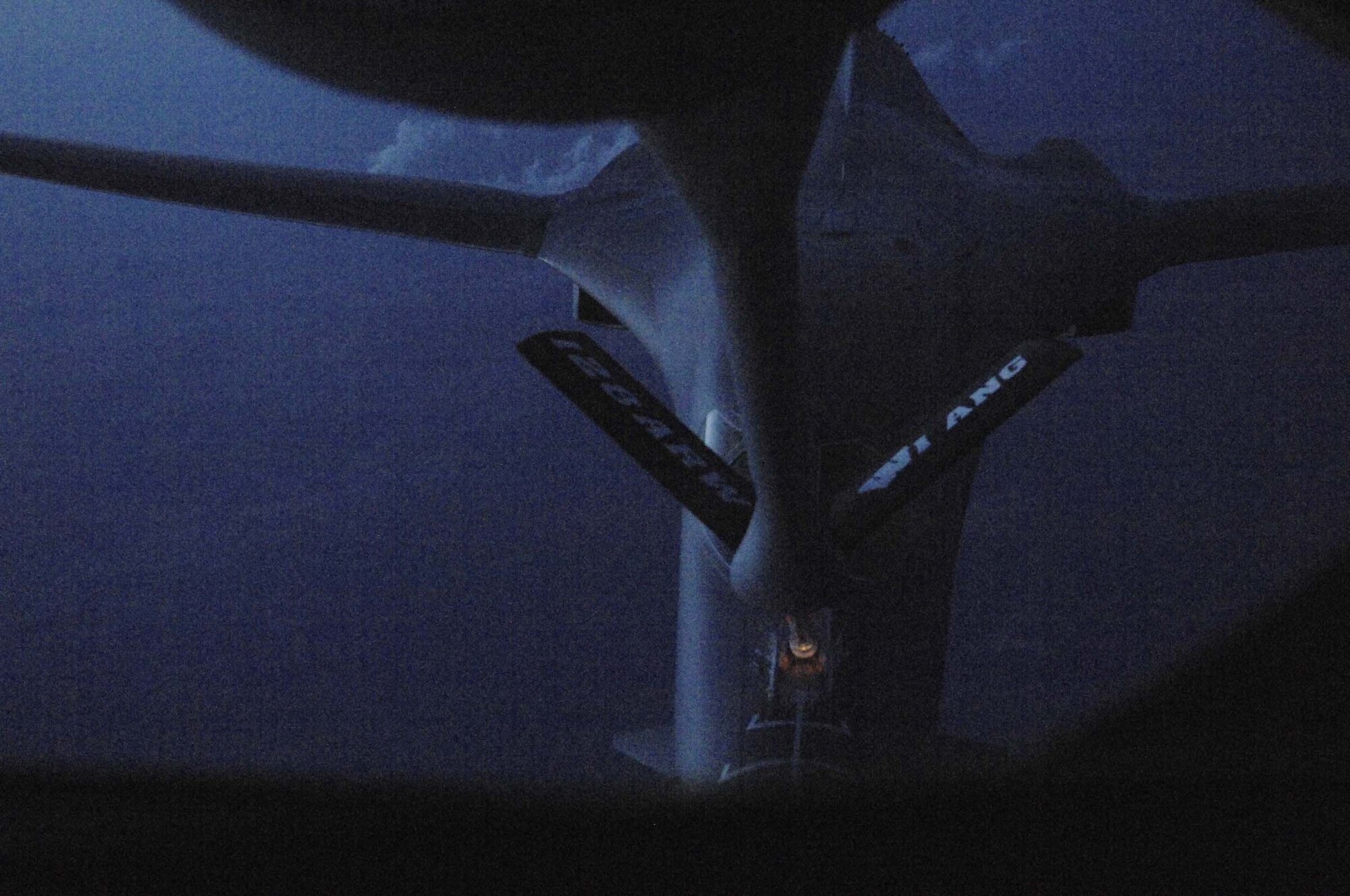 A B-1B Lancer assigned to the 34th Bomb Squadron is refueled by a KC-135R during a training sortie over South Dakota, May 12. The KC-135R was piloted by members of the Wisconsin National Guard's 128th Air Refueling Wing. The team was here for ten days to enable Ellsworth's 24-hour surge operations. (U.S. Air Force photo/Airman 1st Class Abigail Klein)