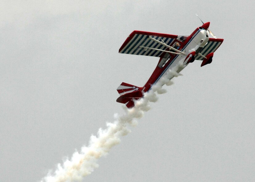 Ed Hamill performed aerial maneuvers for the 2009 Defenders of Liberty Air Show crowd in his aircraft Dream Machine May 9. The Dream Machine is a factory built biplane designed and first built by Curtis Pitts over fifty years ago. (U.S. Air Force Photo by Trina R Jeanjacques) (Released)