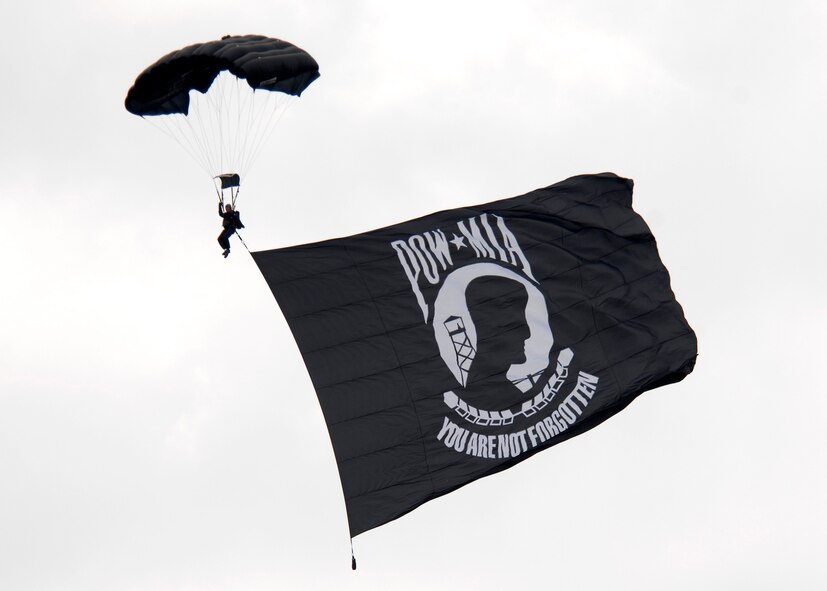 The 2009 Defenders of Liberty Air Show kicked off with the entertainers of the Sky Team jumpers who displayed a 1,800 square foot Prisoners of War/Missing in Action flag May 9. (U.S. Air Force Photo by Trina R Jeanjacques) (Released))