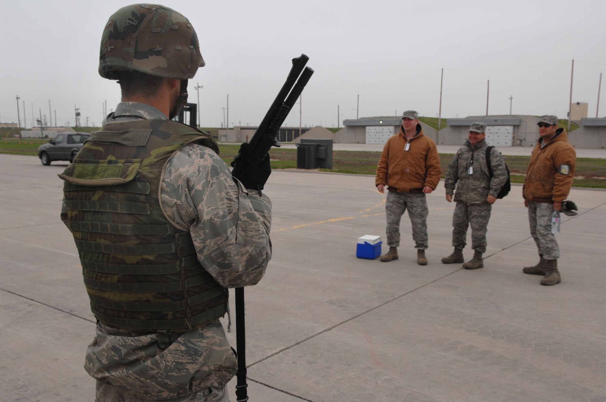 MINOT AIR FORCE BASE, N.D. – Senior Airman Donald Derusha, 5th Munitions Squadron, stands guard at the Weapons Storage Area during a Nuclear Surety Inspection here, May 15. An NSI is designed to evaluate a unit's readiness to execute nuclear operations. Areas to be evaluated during the NSI include operations, maintenance, security, and support activities needed to ensure the wing performs its mission in a safe, secure and reliable manner. This no-notice inspection is expected to conclude May 22. (U.S. Air Force photo by Staff Sgt. Stacy Moless)