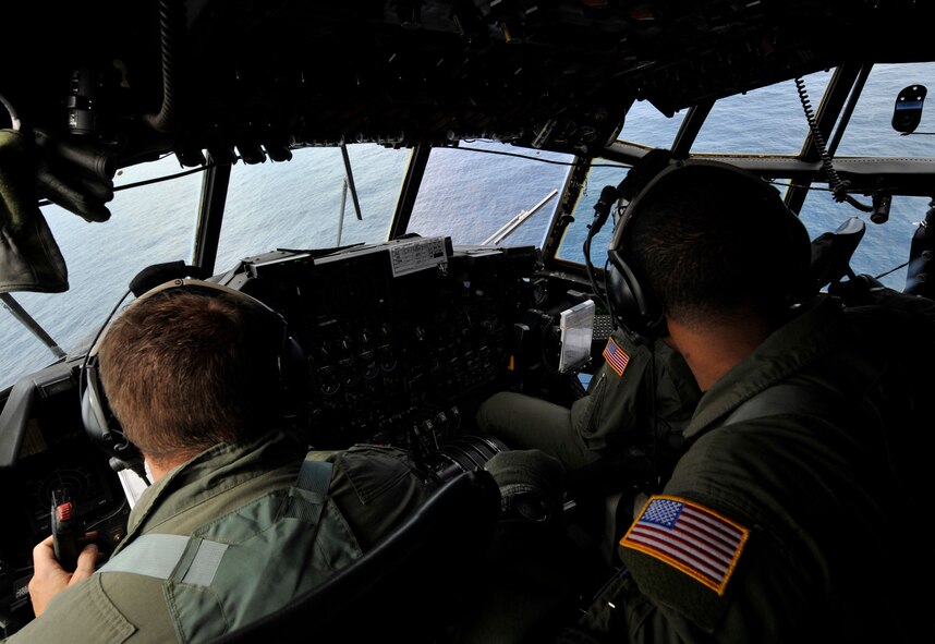 MOODY AIR FORCE BASE, Ga. -- Crewmembers from the 71st Rescue Squadron, along with their HC-130 P/N Combat King aircraft, search for missing Haitian immigrants who were reported missing in the Atlantic Ocean May 15. The Moody based crew responded at a moment’s notice to the U.S. Coast Guard's request for assistance with the search and rescue mission. (U.S. Air Force photo by Senior Airman Schelli Jones)