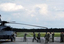 MOODY AIR FORCE BASE, Ga. -- Col. Kenneth Todorov, 23rd Wing commander, is sprayed down immediately following his final flight on a HH-60G Pave Hawk helicopter here May 14. Colonel Todorov is scheduled to relinquish command of the 23rd Wing to Col. Kevin Henderson on May 28. (U.S. Air Force photo by Senior Airman Brittany Barker) 