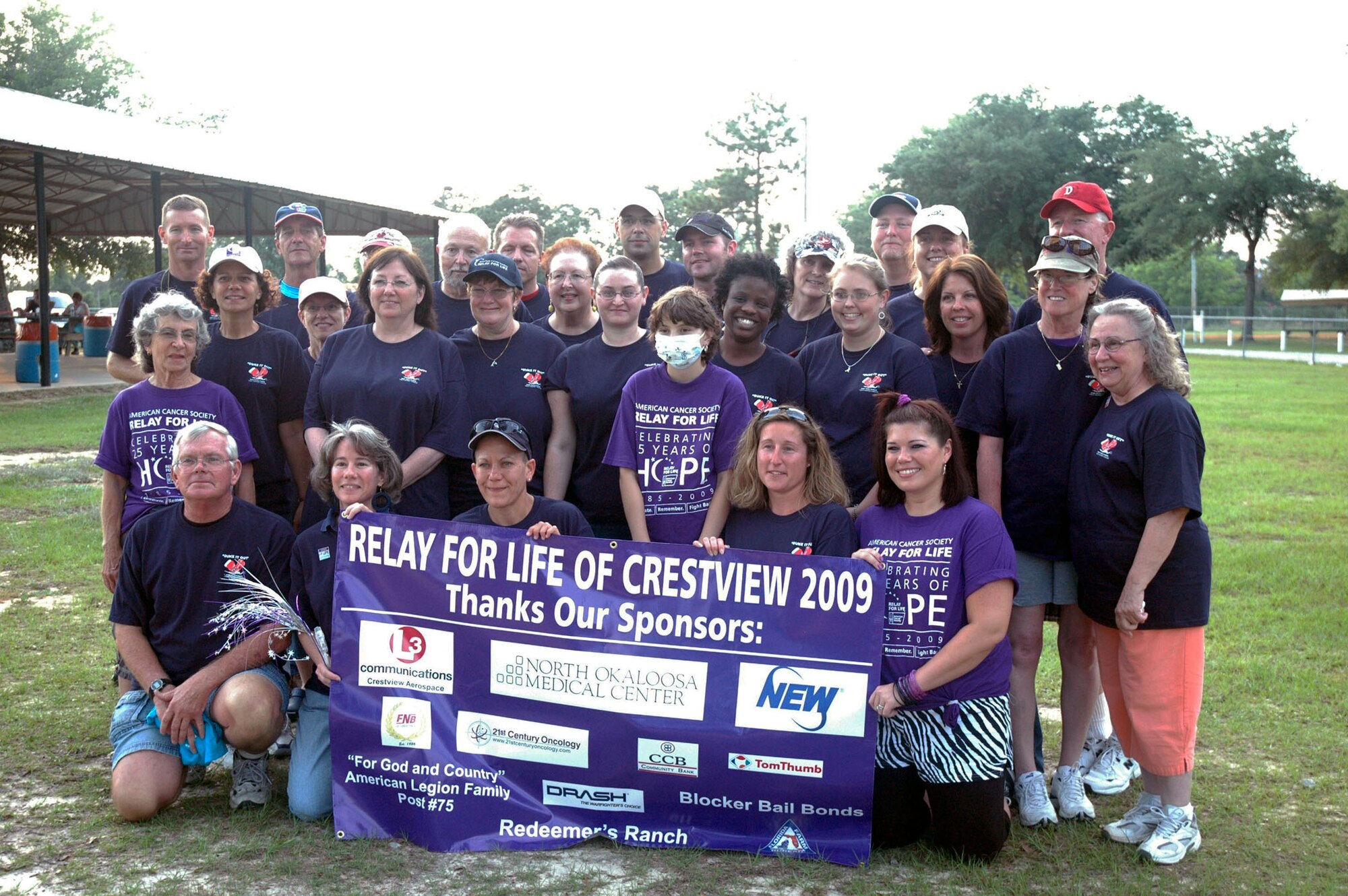 Volunteer members of the 919th Special Operations Wing’s “Duke it Out” Relay for Life team pose for a photo just prior to their relay walk event May 15 at Old Spanish Trail Park in Crestview.   Each year, the “Duke it Out” team remembers those who have passed away due to cancer with a luminaria dedicated to all.   Benefit relay and other Relay for Life events continued through the night.  (U.S. Air Force photo/James Brock III)
