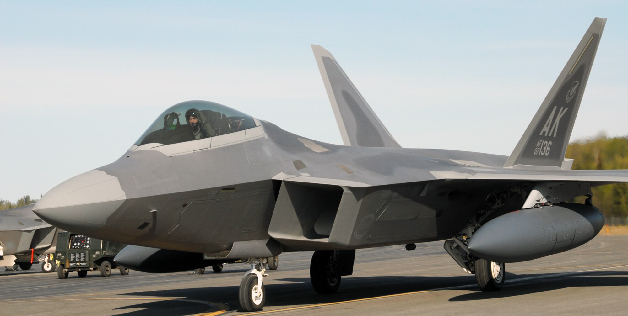 ELMENDORF AIR FORCE BASE, Alaska – Reserve fighter pilot Maj. Chad “Motor” Feucht, 302nd Fighter Squadron, taxis the flightline before departing for Andersen Air Force Base, Guam, May 12. The fighter pilot, assigned to Air Force Reserve Command’s 477th Fighter Group, is flying the Air Force’s newest fighter to the Pacific Theater, marking the F-22’s fifth and sixth deployments in the area. (U.S. Air Force photo/Staff Sgt. Andrea Knudson)