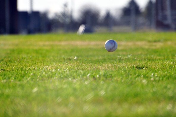 A ball lands in center field for an out. Anything hit that was not a home run was an out. Each batter got 10 outs during the first round and seven outs in the second round. The batter who had the most home runs in the second round was the winner.