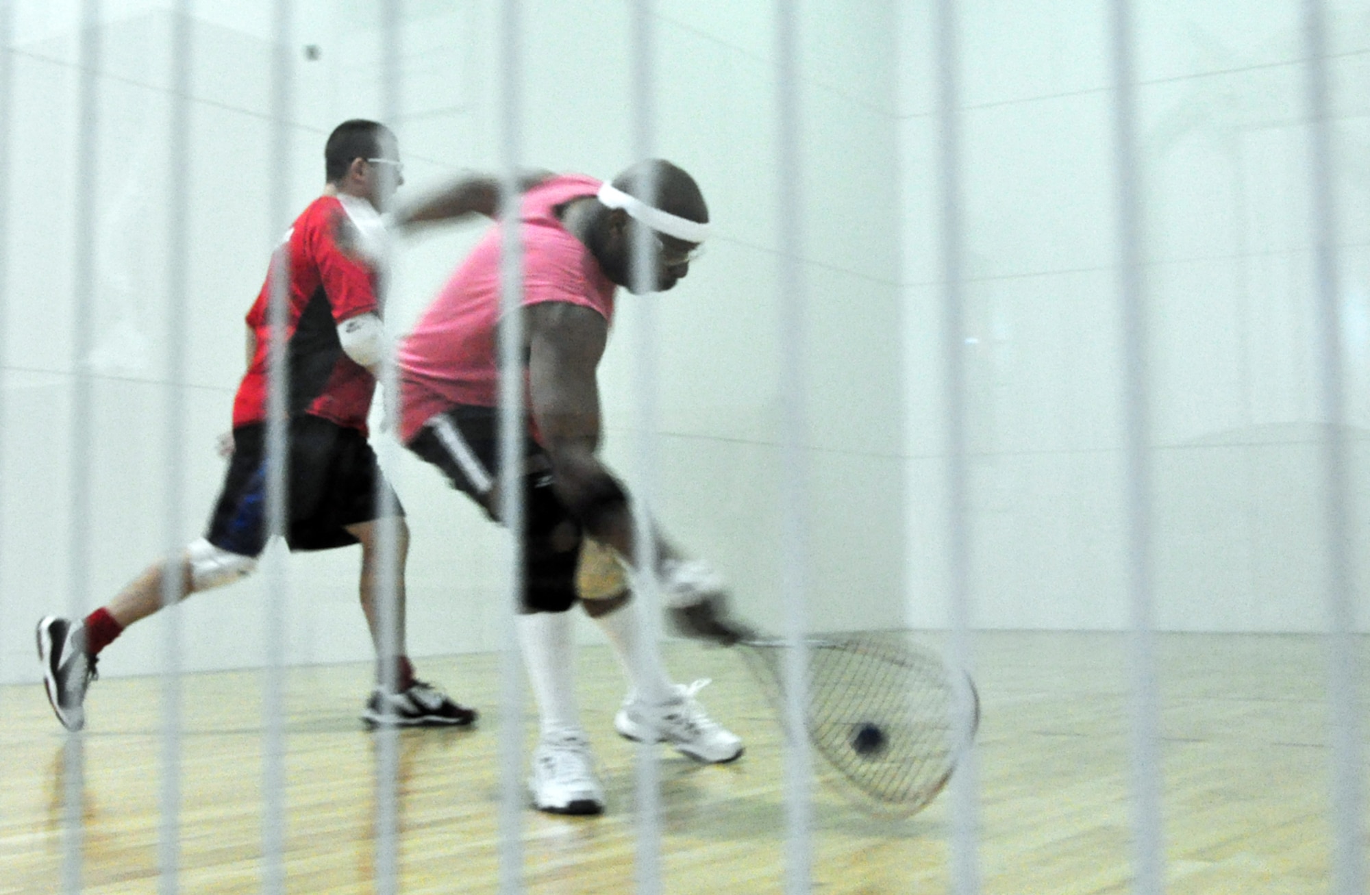 Harold Davis, 76th Maintenance Support Group, returns a shot from Sergeant Suendermann during the championship game of the base racquetball tournament. Mr. Davis was here from Tinker Air Force Base, Okla., and got to participate in the tournament. Sergeant Suendermann, beat Mr. Davis 15-10, 15-10 in the final match.