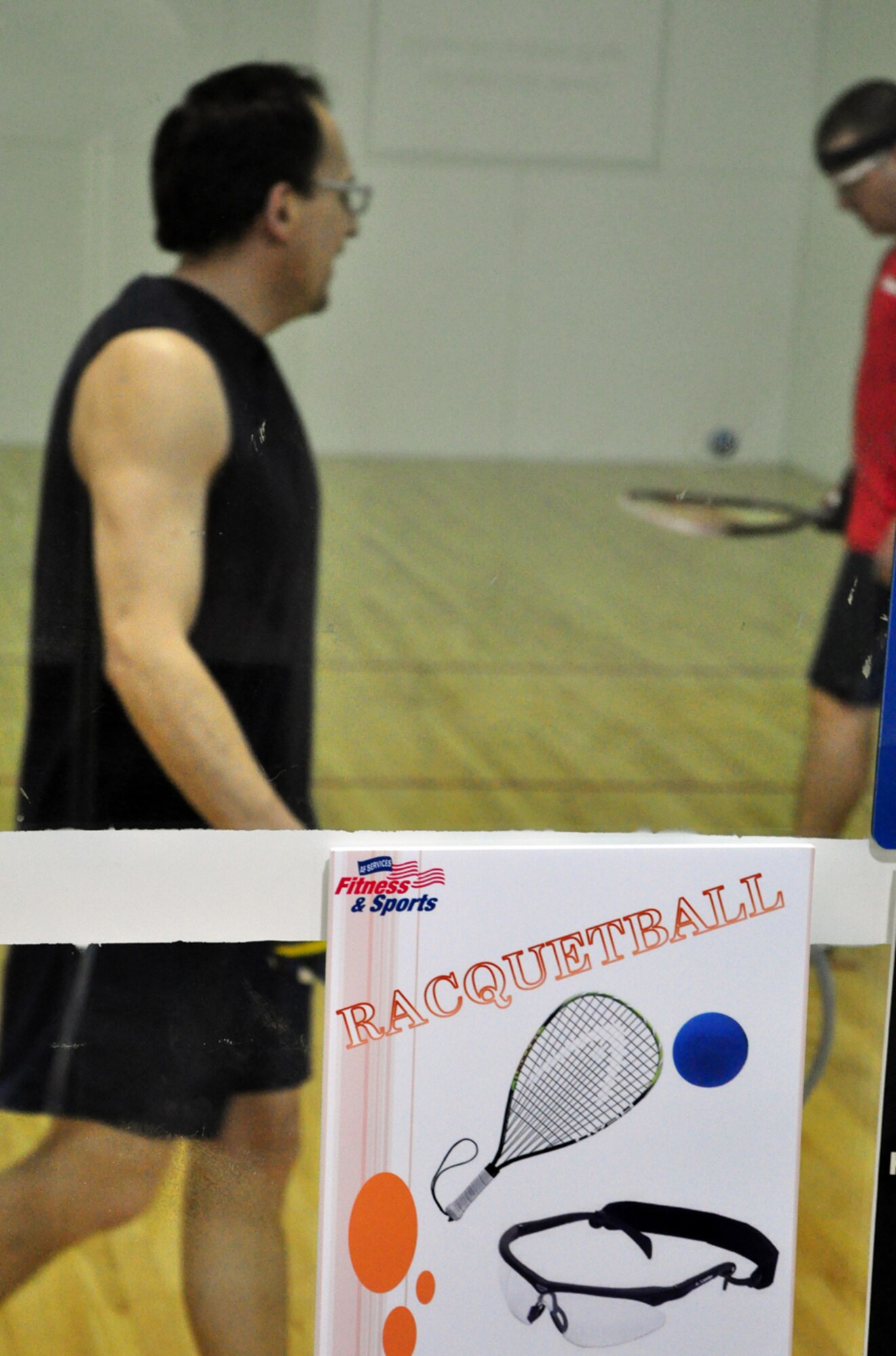 Glenn Garcia, family advocacy outreach manager, competes against Master Sgt. Al Suendermann, 90th Medical Group, during a base racquetball tournament May 9 at the Freedom Hall Fitness Center. Sergeant Suendermann, a member of the Air Force racquetball team, won the tournament (U.S. Air Force Photos/Staff Sgt. Chad Thompson).