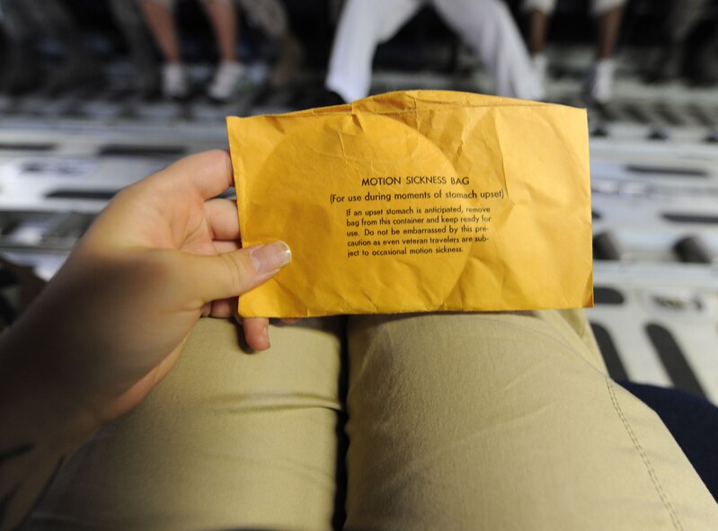 Barksdale Airmen took a performance flight on the C-130 Hercules, Fat Albert. Every Airman received a motion sickness bag in case of an emergency. Fat Albert, the U.S. Navy Blue Angels dedicated transport aircraft, is operated by an all-Marine Corps crew consisting of three officers and five enlisted personnel. (United States Air Force photo by Senior Airman Alexandra Sandoval) (RELEASED)