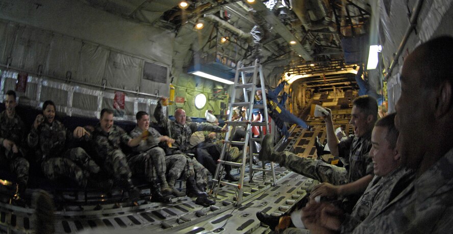 Members of the Navy Flight Demonstration Squadron, Blue Angels, and passengers experience zero-gravity during the Fat Albert flight May 9 at the 2009 Defenders of Liberty Air Show. Thirty-two individuals were allowed to join the Angels on the flight. (U.S. Air Force Photo by Senior Airman Alyssa C. Miles)(RELEASED)