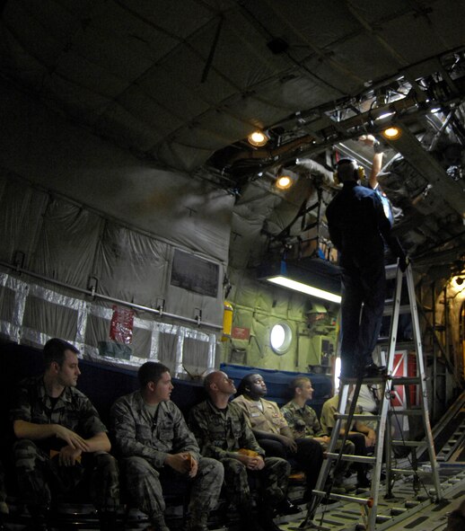 Members of the Navy Flight Demonstration Squadron, Blue Angels, and passengers experience zero-gravity during the Fat Albert flight May 9 at the 2009 Defenders of Liberty Air Show. Thirty-two individuals were allowed to join the Angels on the flight. (U.S. Air Force Photo by Senior Airman Alyssa C. Miles)(RELEASED)