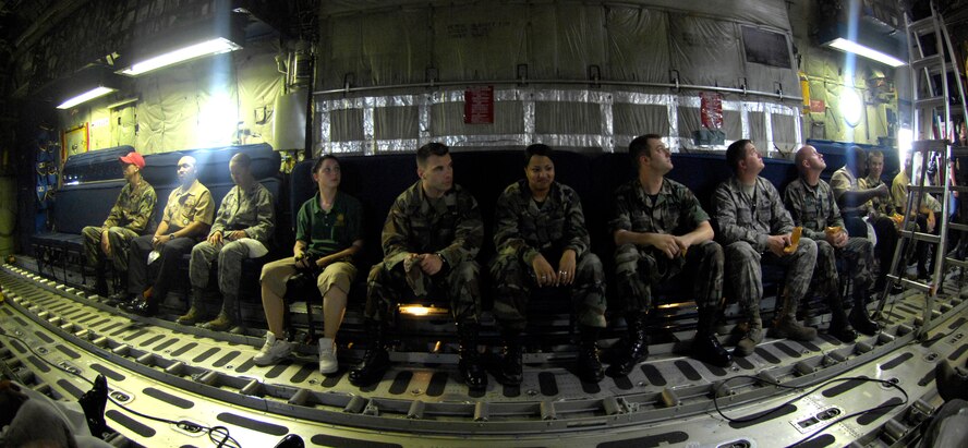 Members of the Navy Flight Demonstration Squadron, Blue Angels, and passengers experience zero-gravity during the Fat Albert flight May 9 at the 2009 Defenders of Liberty Air Show. Thirty-two individuals were allowed to join the Angels on the flight. (U.S. Air Force Photo by Senior Airman Alyssa C. Miles)(RELEASED)