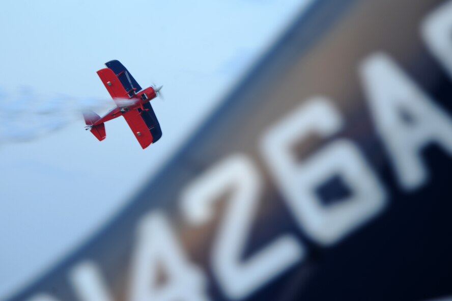 Ed Hamil performs in the Dream Machine during the 2009 Defenders of Liberty Twillight Air Show, May 8. The Dream Machine is a factory built biplane designed and first built by Curtis Pitts over fifty years ago. (United  States Air Force photo by Airman 1st Class Brittany Y. Batman)(RELEASED).
