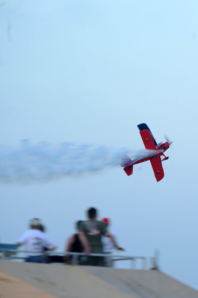 Ed Hamil performs in the Dream Machine during the 2009 Defenders of Liberty Twillight Air Show, May 8. The Dream Machine is a factory built biplane designed and first built by Curtis Pitts over fifty years ago. (United  States Air Force photo by Airman 1st Class Brittany Y. Batman)(RELEASED).
