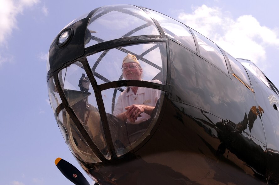 Dennis Bell, Chapter 30 Service Officer of the Disabled American Veterans, sits in the gunner  position of a B-25. The aircraft can be viewed on display at the 2009 Defenders of Liberty Air Show here May 9 and 10.(U.S. Air Force photo by Senior Airman La'Shanette Garrett)(released).
  