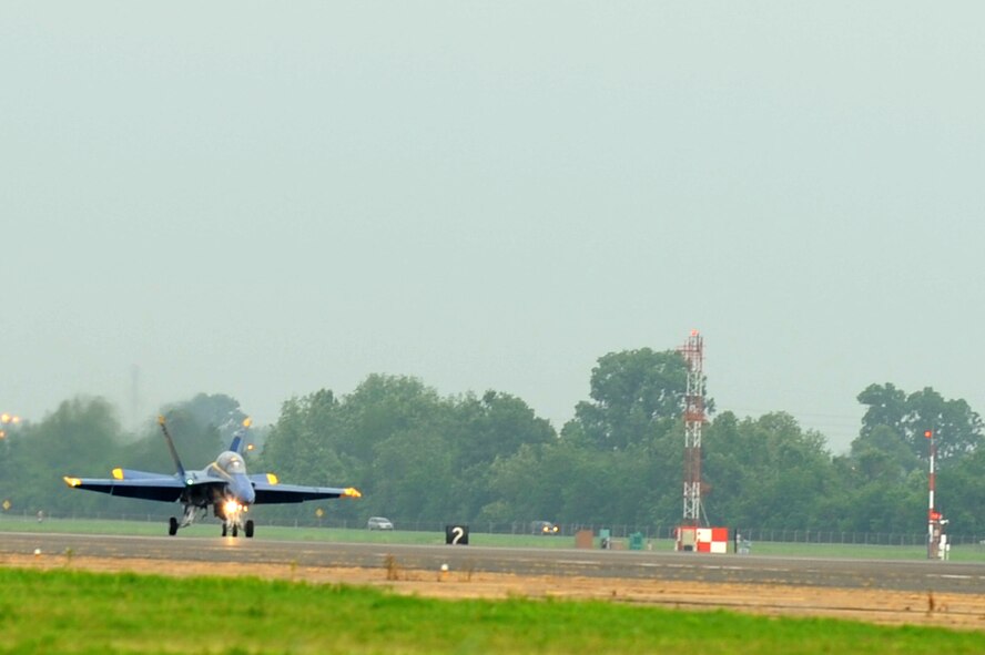 U.S. Navy Lt. Ben Walborn, Blue Angels pilot, lands here May 6 to kick off the 2009 Defenders of Liberty Air show. Lieutenant Walborn joined the Blue Angels in September 2008. He has accumulated more than 1,400 hours and 346 aircraft carrier landings. (U.S. photo by Airman 1st Class Brittany Y. Bateman)(RELEASED)