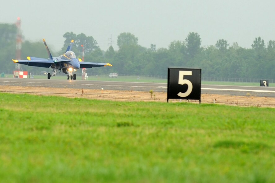 U.S. Navy Lt. Ben Walborn, Blue Angels pilot, lands here May 6 to kick off the 2009 Defenders of Liberty Air show. Lieutenant Walborn joined the Blue Angels in September 2008. He has accumulated more than 1,400 hours and 346 aircraft carrier landings. (U.S. photo by Airman 1st Class Brittany Y. Bateman)(RELEASED)