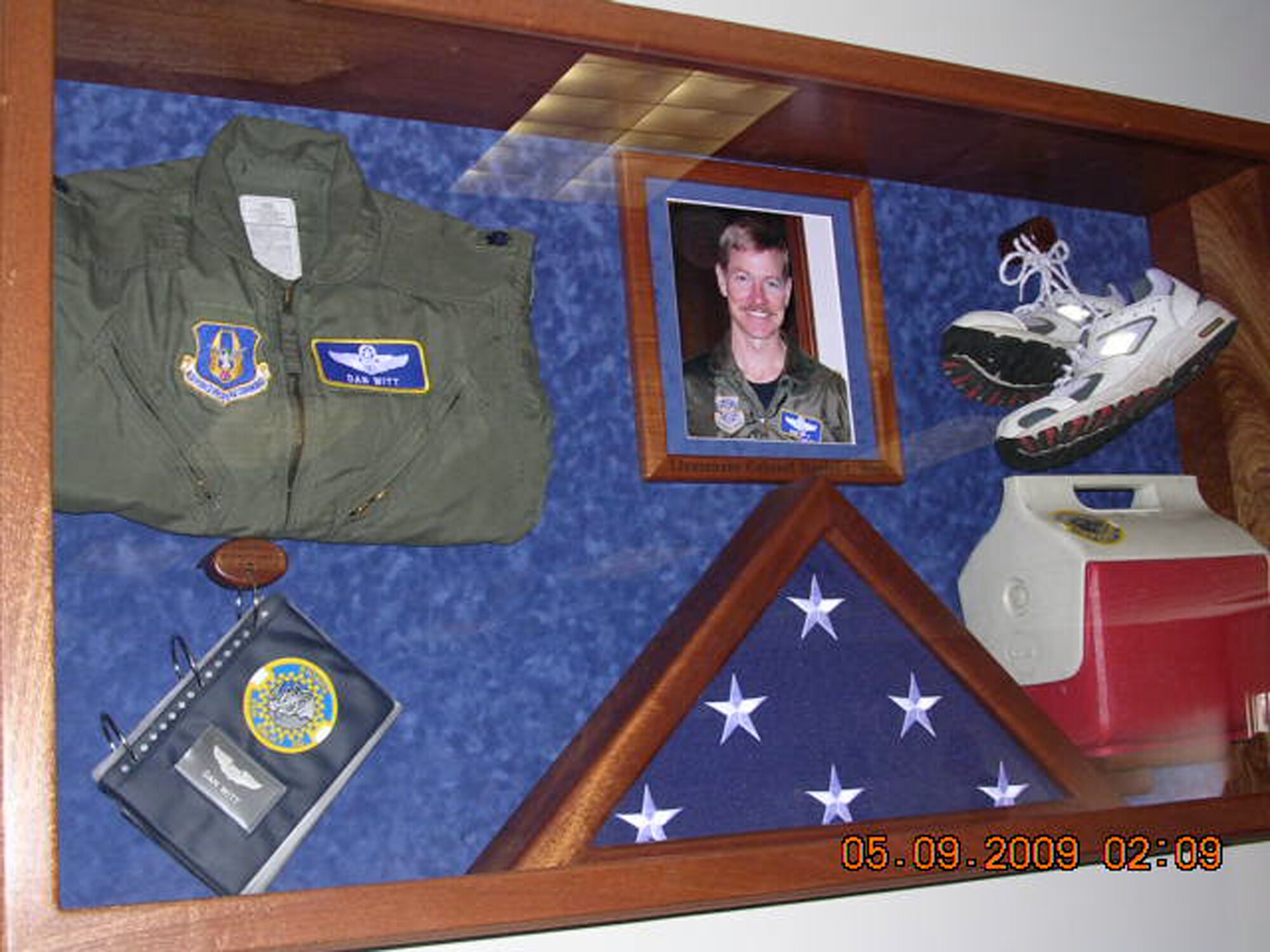 WRIGHT-PATTERSON AIR FORCE BASE, Ohio - The 89th Airlift Squadron dedicated an auditorium to the late Lt. Col. Dan Witt, who was assigned to the squadron.  A shadow box containing the personal items of Colonel Witt is on display in the auditorium. (Courtesy photo)