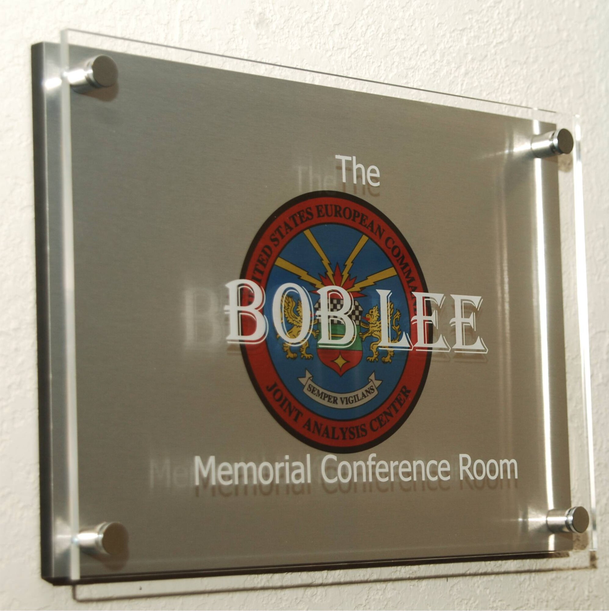 The new sign for the the "Bob Lee Memorial Conference Room" dedicated on May 15, 2009.  Mr. Robert E. "Bob" Lee served as a purchasing agent at the JAC from 2003 until 2008 as part of a career of service to the nation spanning 26 years of service in the U.S. Air Force and 21 years of federal civil service. (U.S. Air Force photo by Staff Sgt. Chad E. Chisholm)