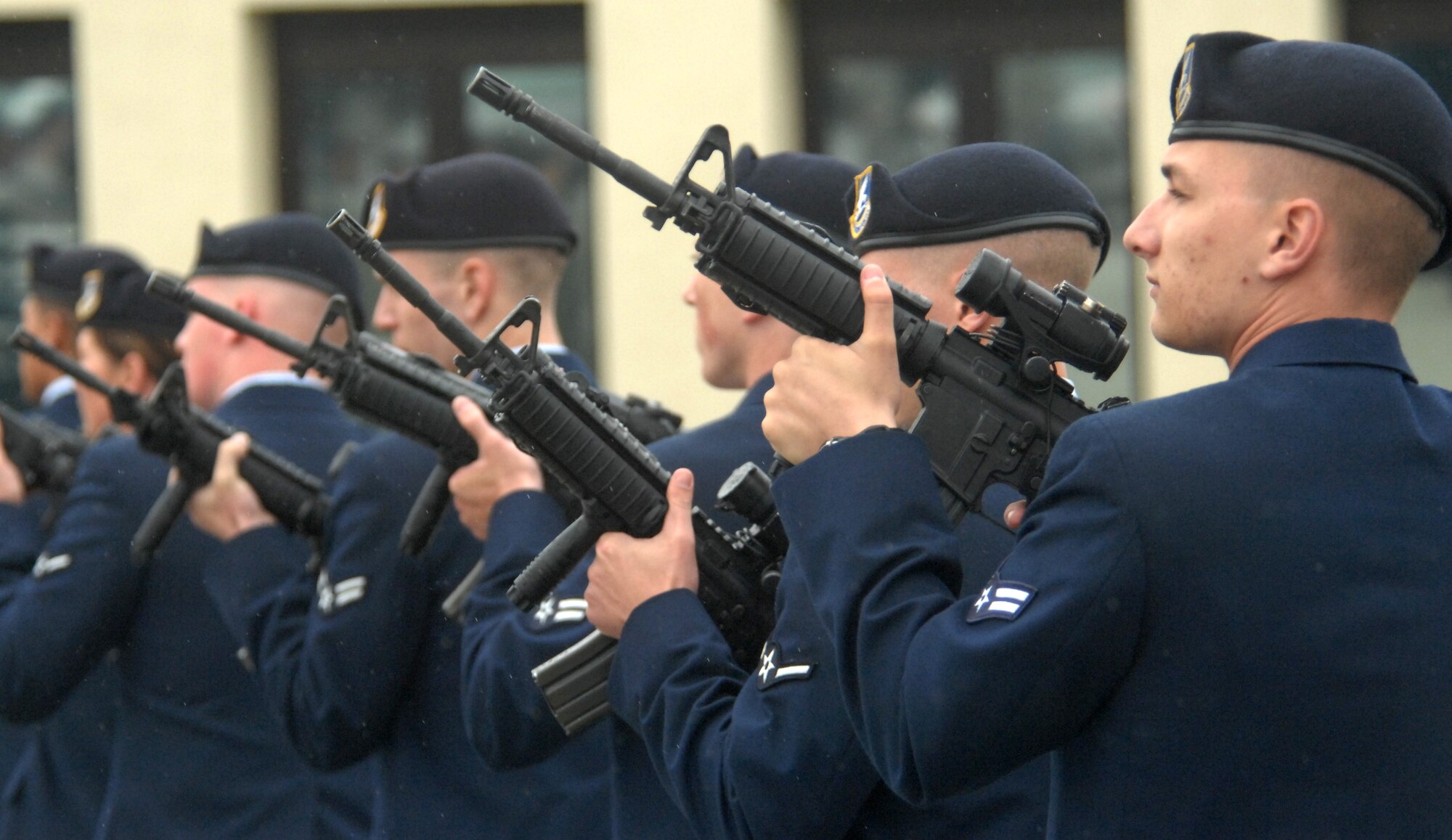 SPANGDAHLEM AIR BASE, GERMANY-- Members of the 52nd Security Forces Squadron perform a 21-gun salute during retreat May 15, 2009.  The 52nd SFS held a retreat ceremony in memory of law enforcement officials, both civilian and military, who lost their lives during the past year. (U.S. Air Force photo by Master Sgt. Bill Gomez) 