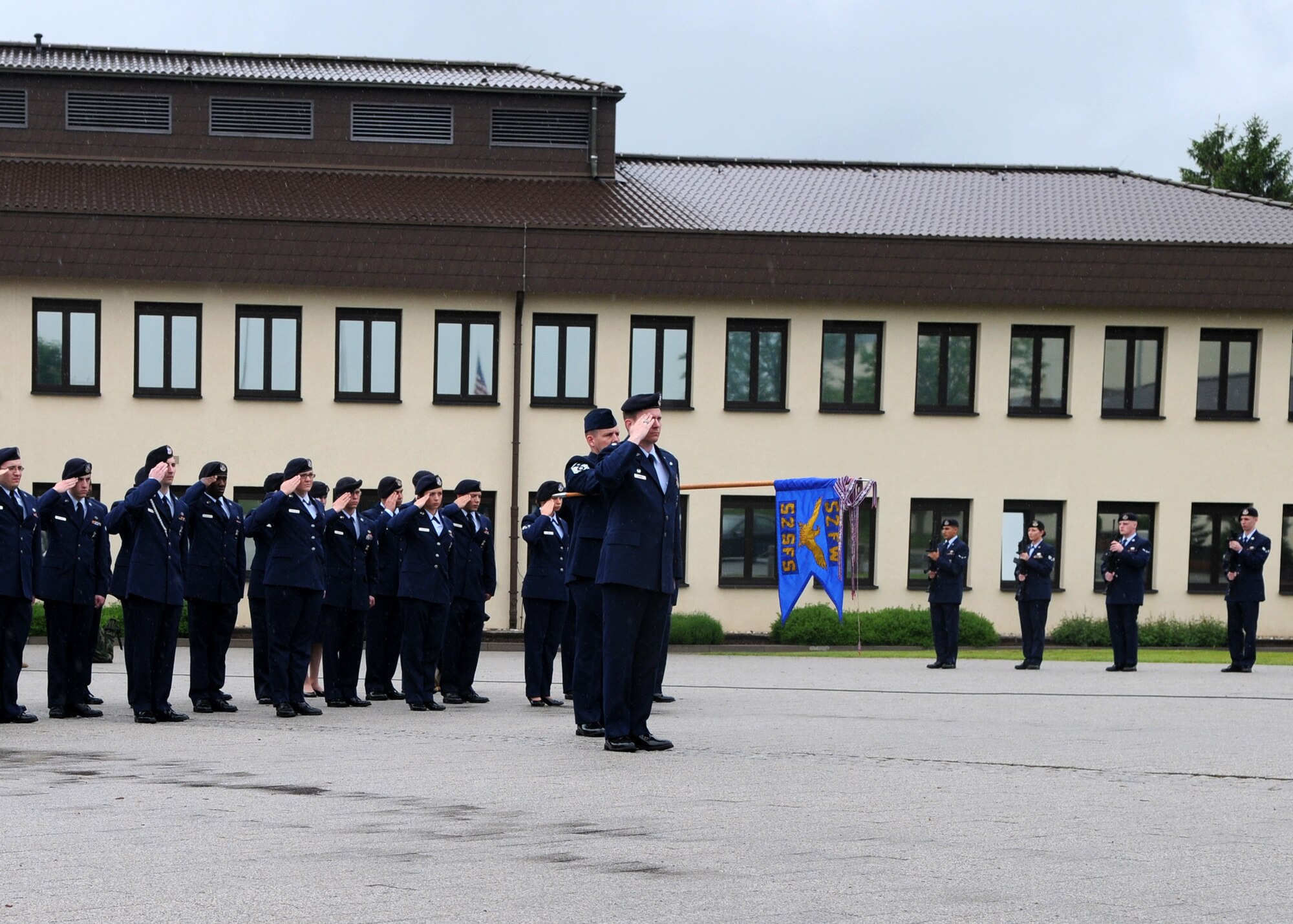 SPANGDAHLEM AIR BASE, Germany -- Members of the 52nd Security Forces Squadron stand in formation as part of a formal retreat ceremony May 15, 2009.  The 52nd SFS honored their fallen brethren during Police Week May 11-15.  (U.S. Air Force photo by Staff Sgt. Heather M. Norris)