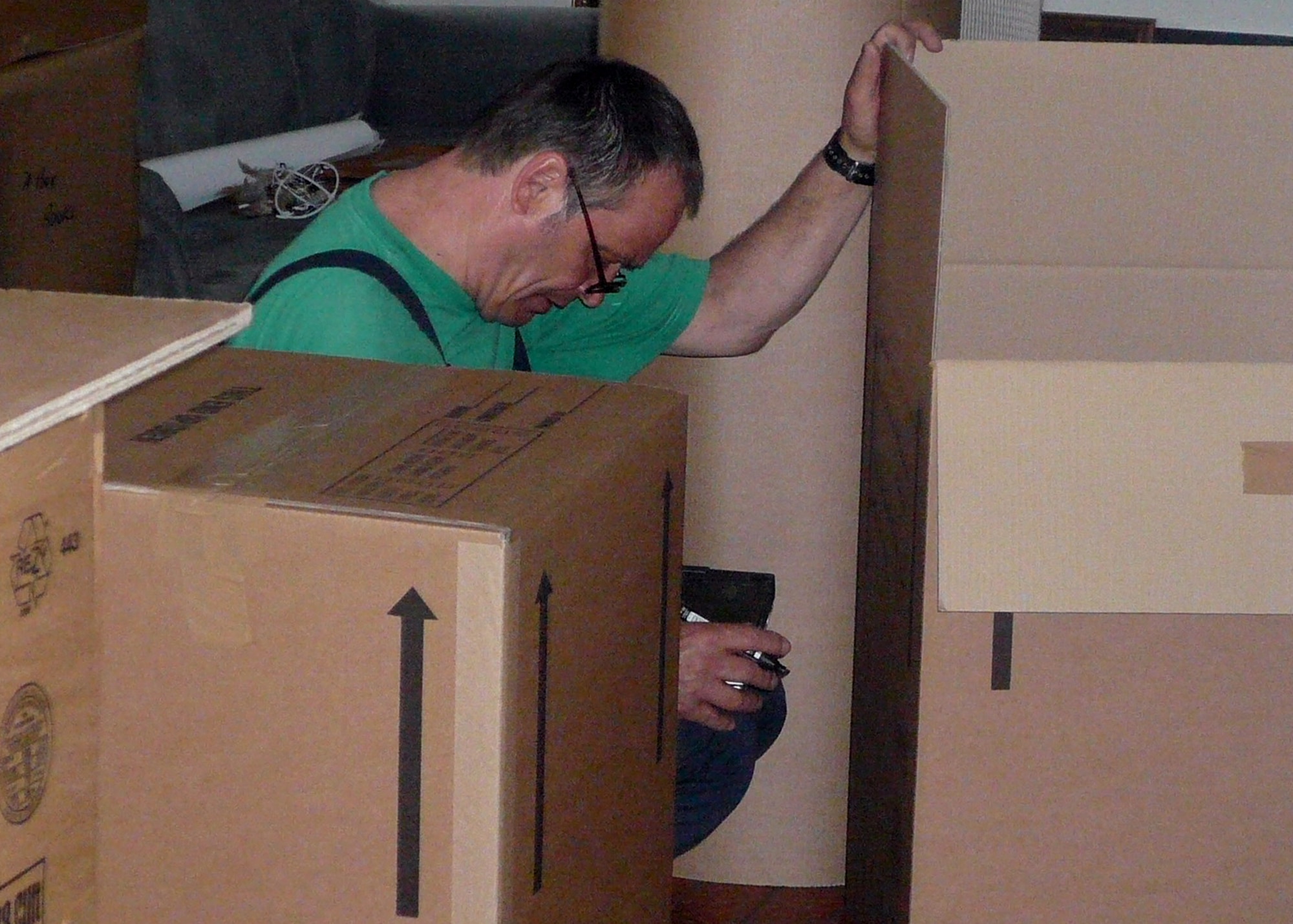 SPANGDAHLEM AIR BASE, Germany -- Movers from Transco Bitburg inventory a military member’s items prior to loading them for shipment to the next duty station. The 52nd Logistics Readiness Squadron's Traffic Management Office aids Spangdahlem members in relocation.  (U.S. Air Force photo by Staff Sgt. Angela TerMeer)