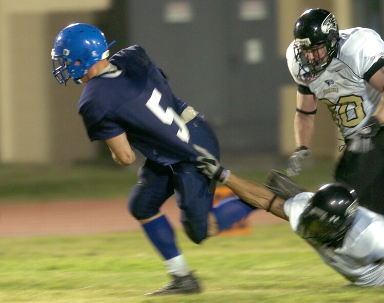 YOKOTA AIR BASE, Japan -- Yokota Warriors' running back Kevin Fortin scores the first of his two touchdowns May 16 in a 28-25 loss to the Yokosuka Seahawks in U.S. Forces Japan-American Football League action at Yokota's Bonk Field. The Warriors committed two turnovers in the final five minutes of the game to allow Yokosuka to rally for the win. Yokota's next home game is 6 p.m. May 22 vs. Torii Station from Okinawa. (U.S. Air Force photo/Master Sgt. Matt Summers)