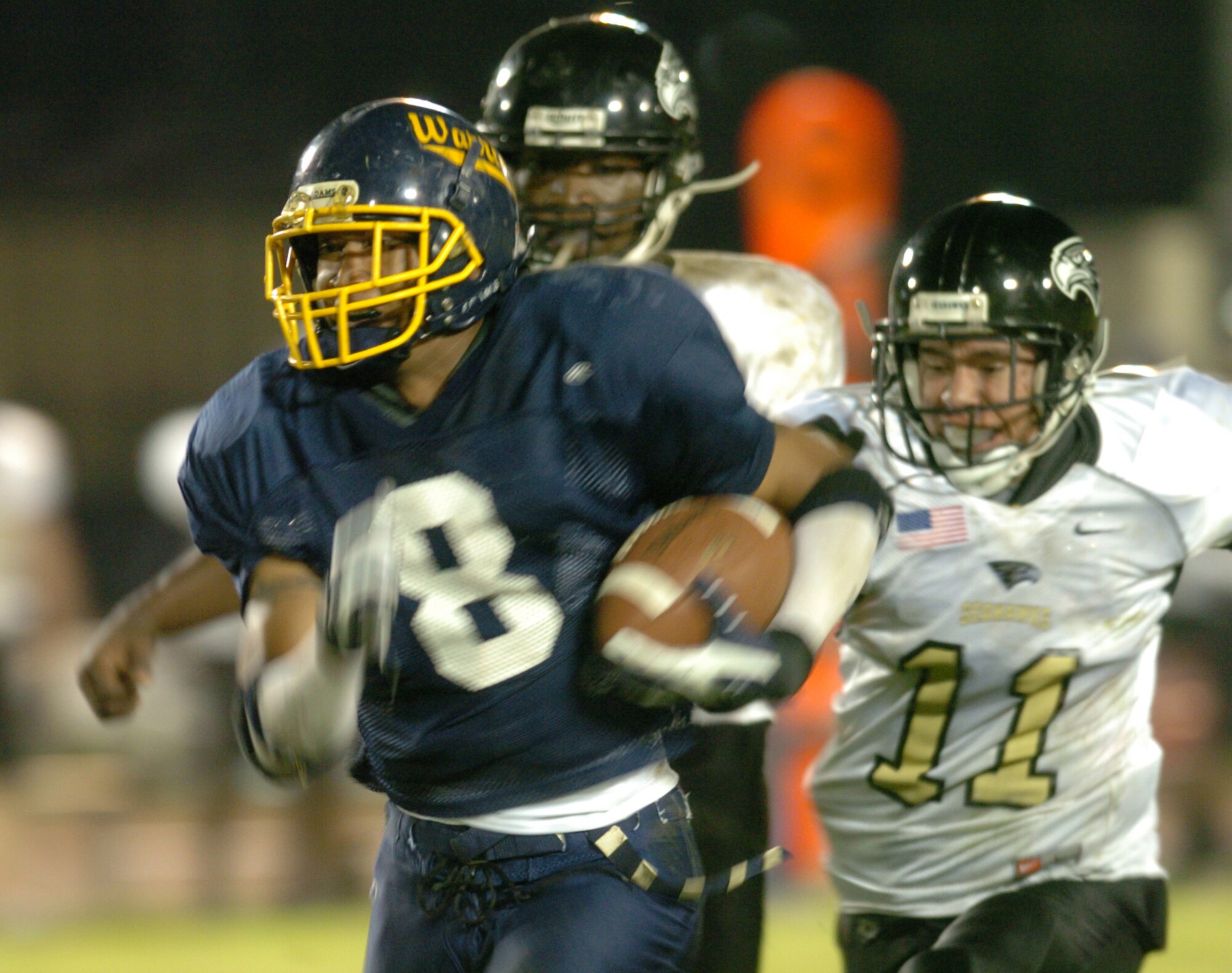 YOKOTA AIR BASE, Japan -- Yokota Warriors' running back Michael Mathis scores the second of his two touchdowns May 16 in a 28-25 loss to the Yokosuka Seahawks in U.S. Forces Japan-American Football League action at Yokota's Bonk Field. The Warriors committed two turnovers in the final five minutes of the game to allow Yokosuka to rally for the win. Yokota's next home game is 6 p.m. May 22 vs. Torii Station from Okinawa. (U.S. Air Force photo/Master Sgt. Matt Summers)