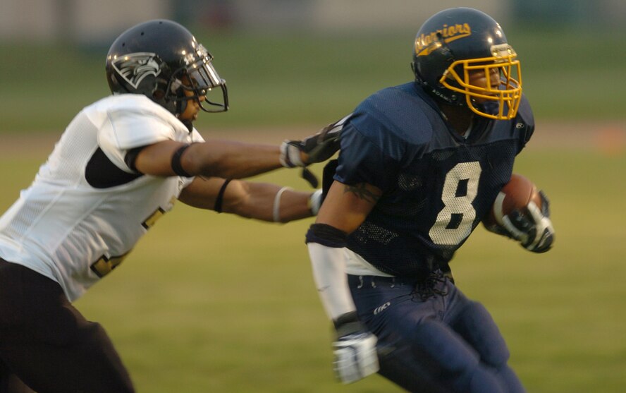 YOKOTA AIR BASE, Japan -- Yokota Warriors' running back Michael Mathis scores the first of his two touchdowns May 16 in a 28-25 loss to the Yokosuka Seahawks in U.S. Forces Japan-American Football League action at Yokota's Bonk Field. The Warriors committed two turnovers in the final five minutes of the game to allow Yokosuka to rally for the win. Yokota's next home game is 6 p.m. May 22 vs. Torii Station from Okinawa. (U.S. Air Force photo/Master Sgt. Matt Summers)