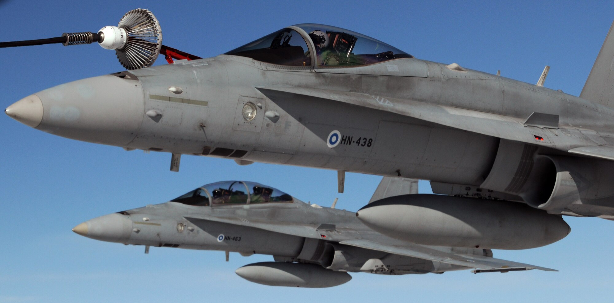 A Finnish jet takes fuel from a USAF KC-135 during recent training in Tampere, Finland. A crew of about 10 Airmen from the 100th Air Refueling Wing traveled to Tampere, Finland, May 2 to participate in a week-long exercise in which U.S. Navy F-18 Hornet pilots taught their Finnish counterparts to refuel from a U.S. Air Force KC-135 Stratotanker.