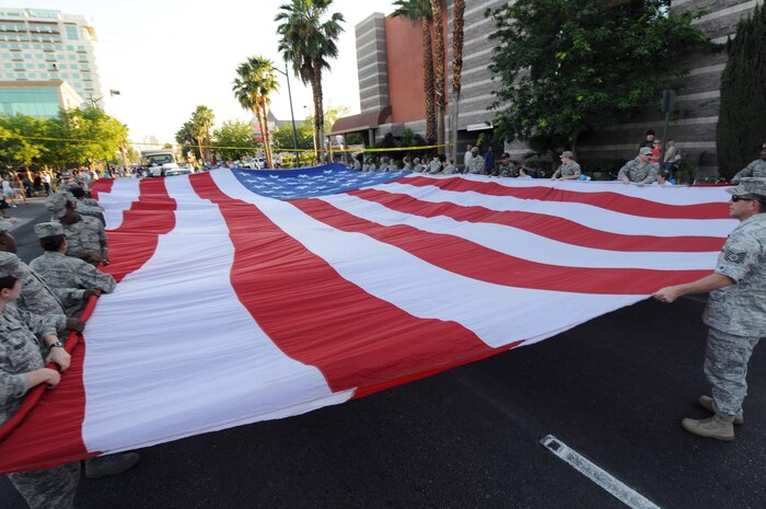 More than 30 Nellis and Creech Airmen showed off their patriotic colors as participants of the Helldorado Days parade in downtown Las Vegas, May 16. This parade celebrated its 75th anniversary, highlighting various cultures and aspects of the city's history. (courtesy photo)