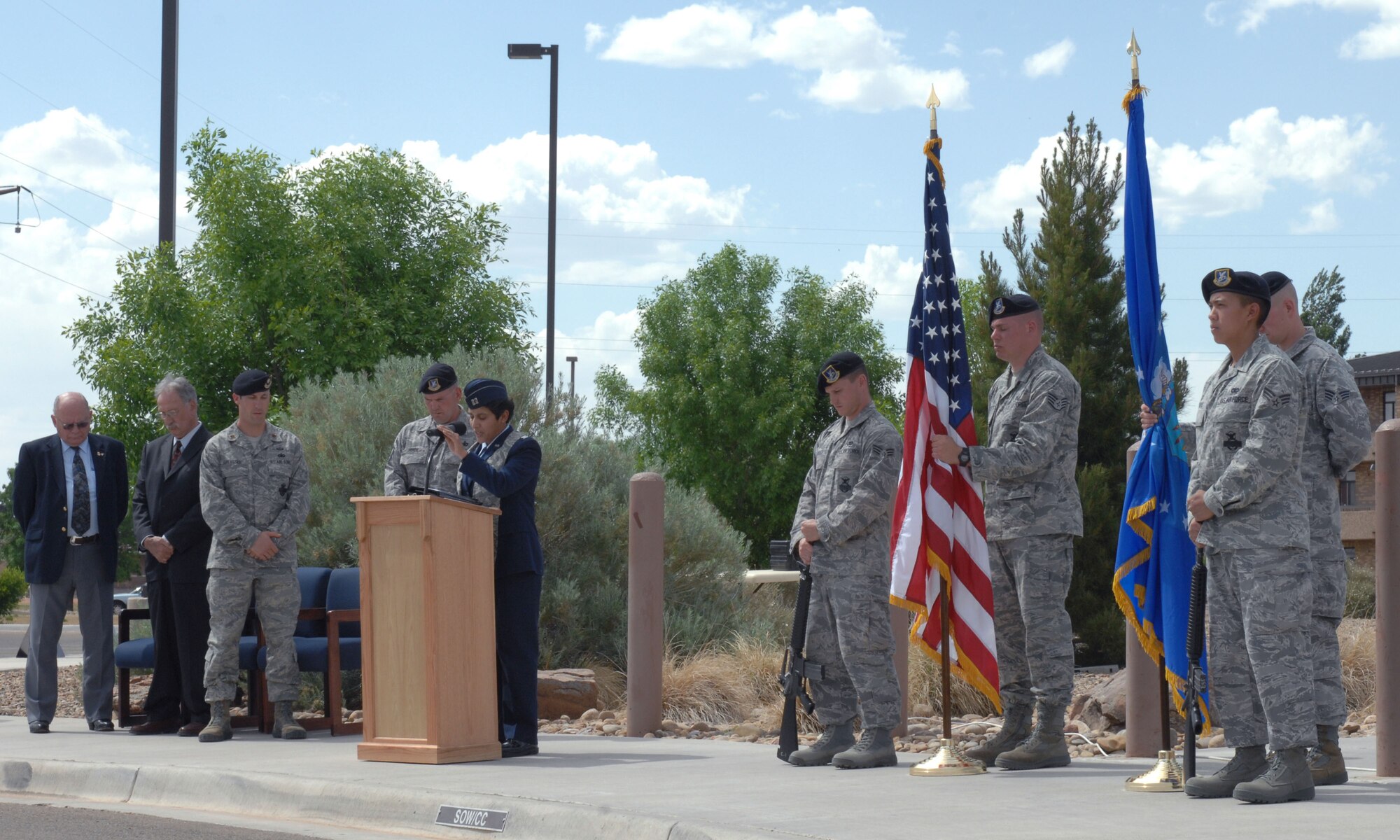 CANNON AIR FORCE BASE, N.M. -- Chaplain (Capt.) Eusebia Rios, of the 27th Special Operations Wing Chapel, gives a word of prayer for Staff Sgt. Terance Jensen?s memorial at the Security Forces building May 15. The service was a part of national Police Week.  (U.S. Air Force photo/Airman 1st Class James Bell) 