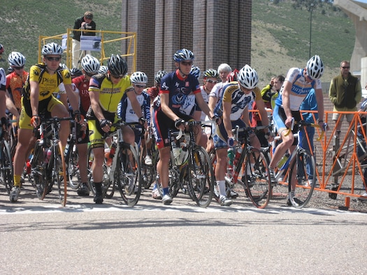 Trevor Johnson, center, and other bicyclists get ready to kick off an 80-mile road race in Fort Collins, Colo., May 8. Johnson won the overall title for the Rocky Mountain Collegiate Cycling Conference Division 2, which named the U.S. Air Force Academy's 2009 cadet cycling team as collegiate team of the year. (U.S. Air Force photo)