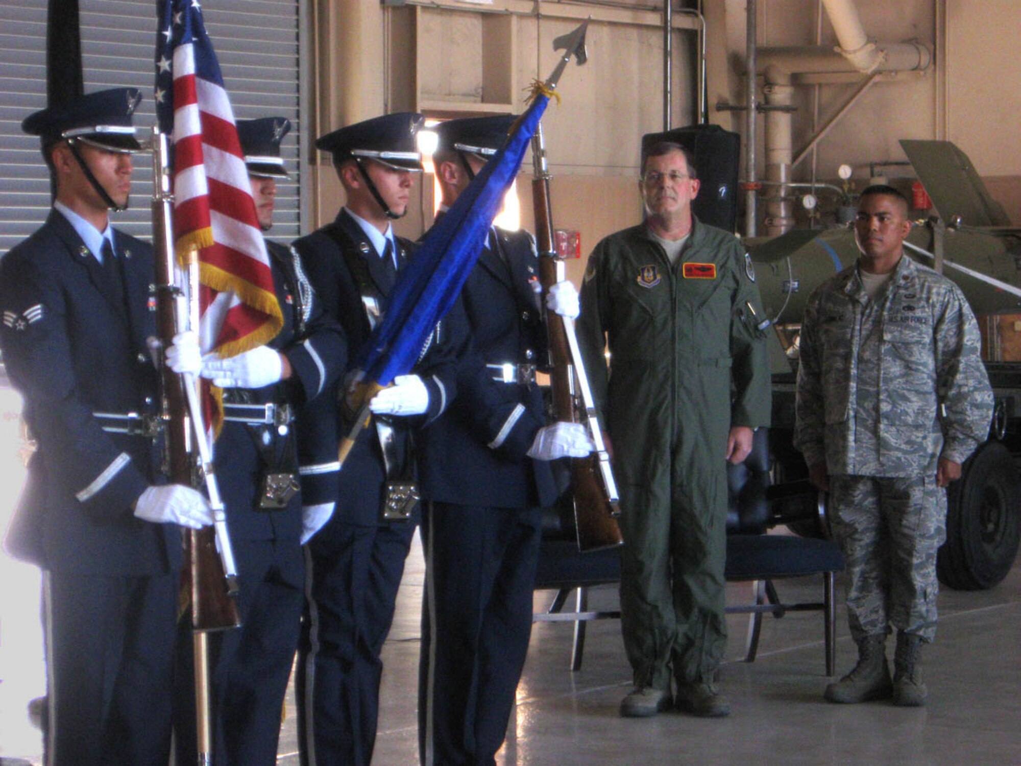 The Nellis Honor Guard posts the colors during the activation ceremony for the U.S. Air Force Reserve's 926th Aircraft Maintenance Squadron on May 15. Through Total Force Integration, the squadron's personnel work on F-15, F-16 and F-22 aircraft within Regular Air Force units.