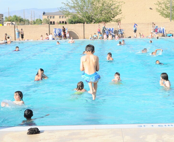 Members from Holloman Air Force Base, N.M., brought their family and friends out to have fun and enjoy the new additions at the Summer Block Party, May 15. The Block Party was the unveiling of the new pool, batting cages, go-karts and paintball that were added for all to enjoy. (U.S Air Force photo/ Airman 1st Class DeAndre Curtiss)