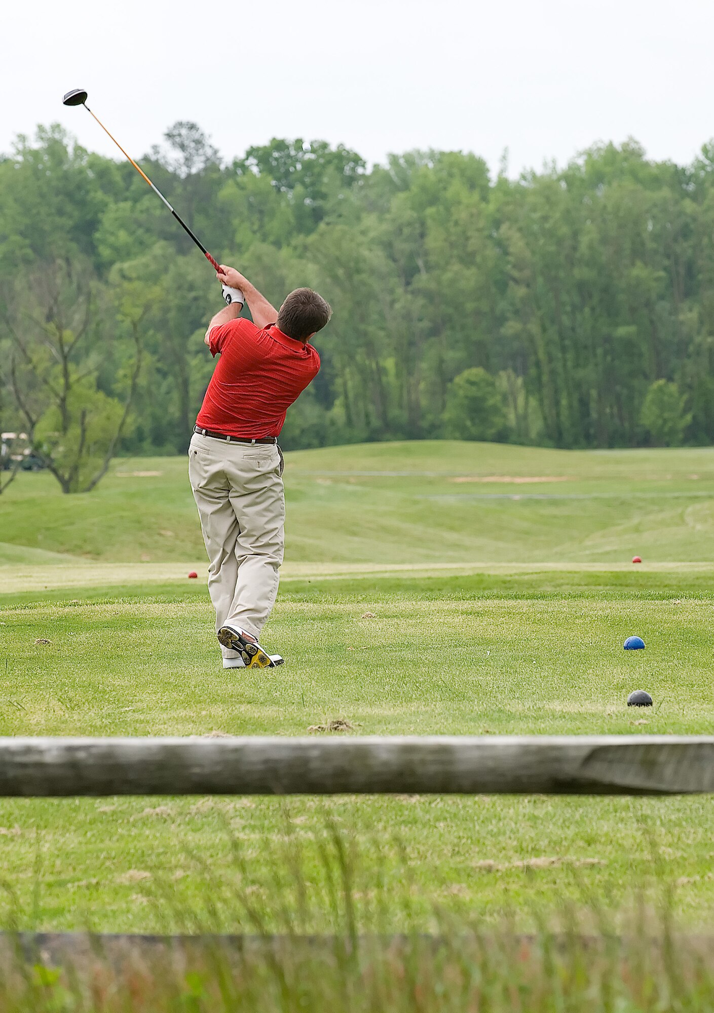 Steven Hoffstadt, 436th Operations Support Squadron, tees off during the Bluesuiters Golf Tournament May 14. The golf tournament is a chance for base and local officials to interact while in a relaxed environment. (U.S. Air Force photo/Jason Minto)
