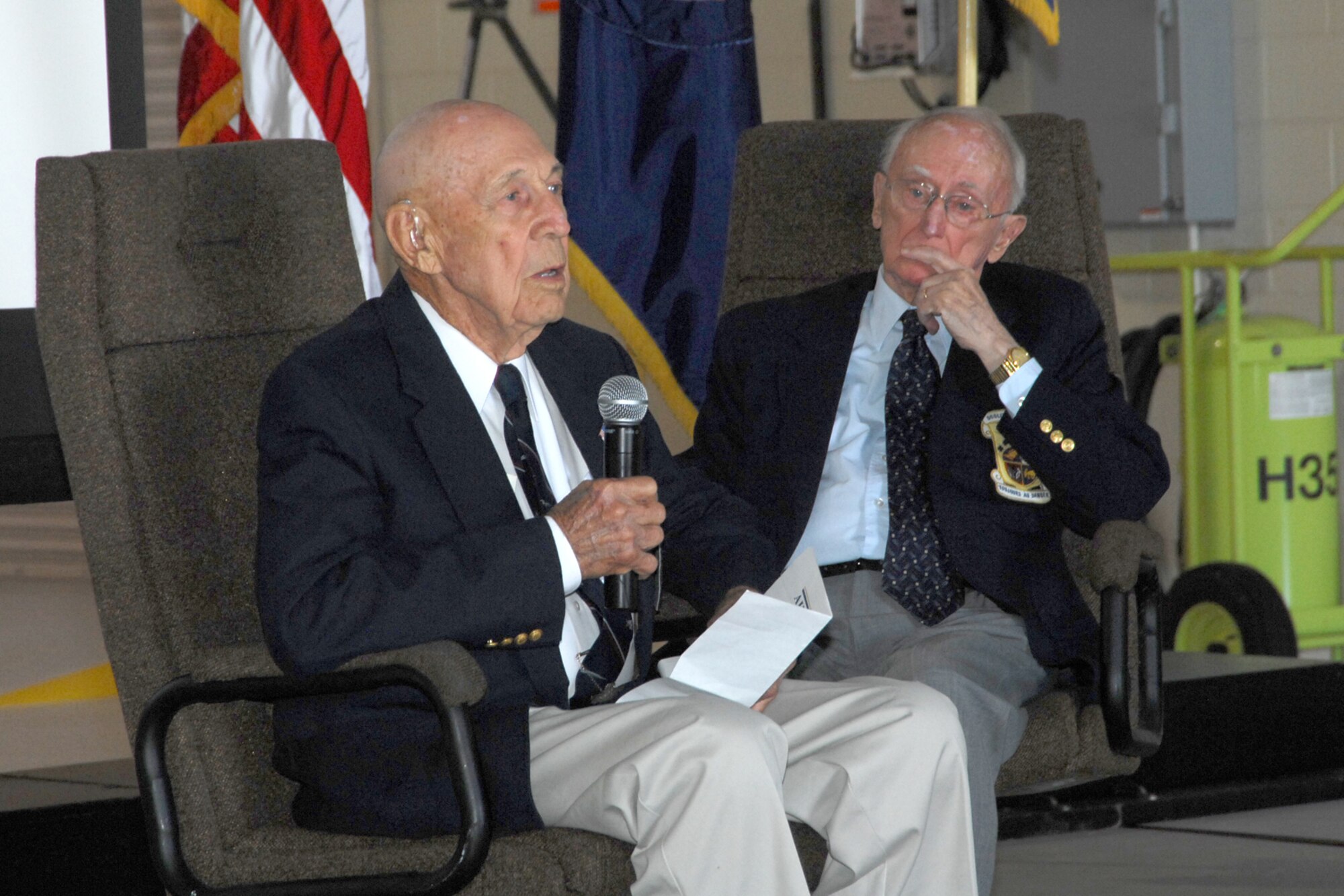 Lt. Col. Richard Cole, USAF (ret.), co-pilot for Lt. Col. Jimmy Doolittle during the Doolittle Raid on Japan, and Raider historian Col. Carroll Glines, USAF (ret.) were guest speakers at the May 19 Selfridge Air National Guard Base Community Council luncheon for a crowd of more than 300 base and community personnel. (USAF photo by John S. Swanson)