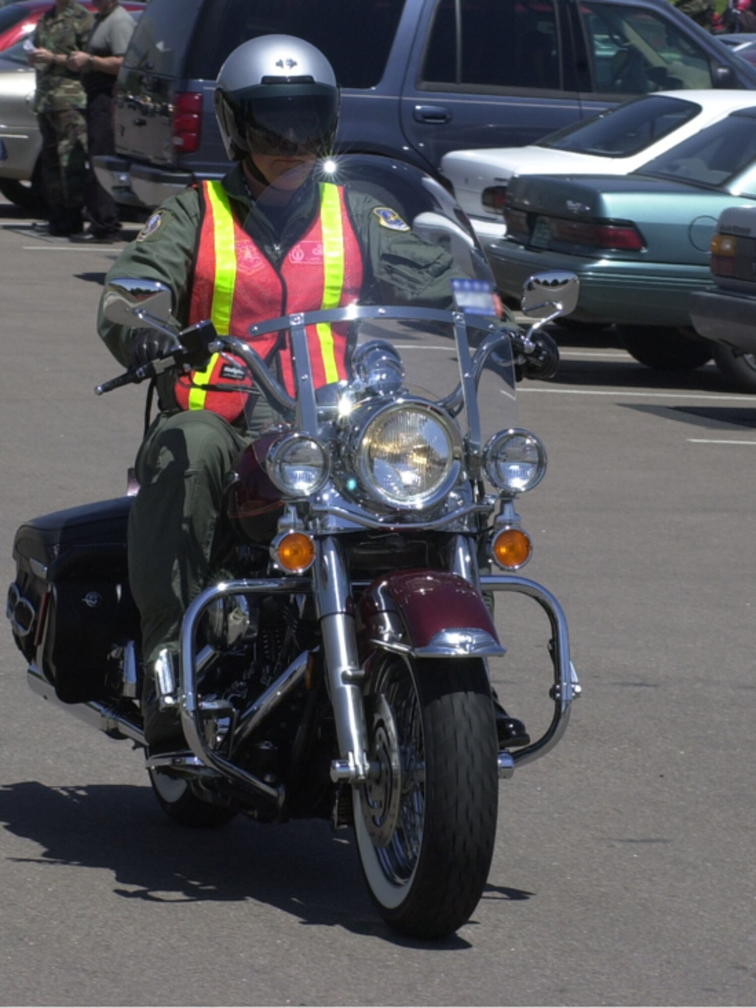 Motorcyclists are required to wear personal protective equipment while riding on base, including an approved helmet, full-finger gloves, sturdy, over-the-ankle footwear, long pants and shirt or jacket, brightly colored garment that is reflective at night, and eye protection. (U.S. Air Force file photo)