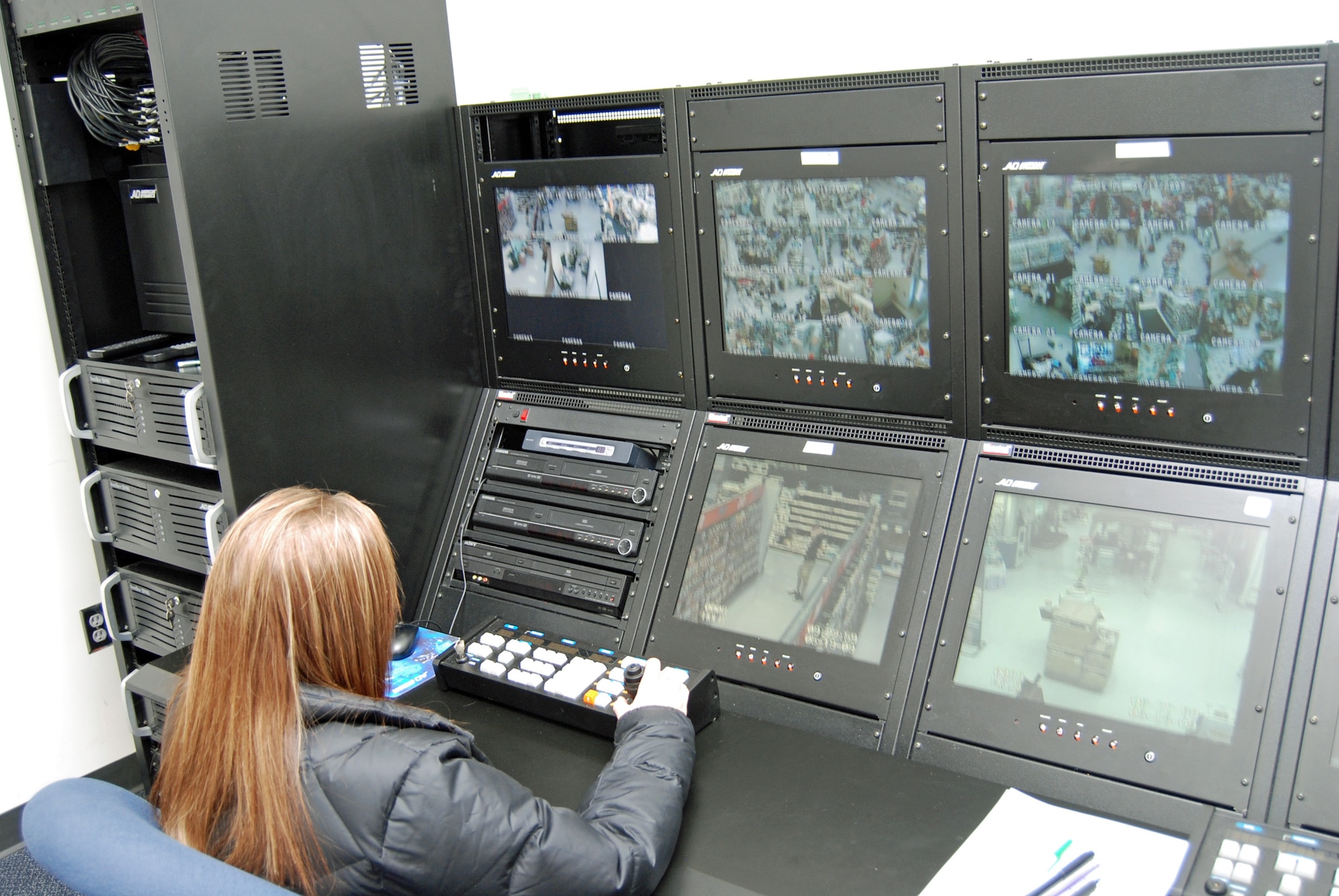 Peterson’s loss prevention staff monitors patrons at the base exchange May 19. Among Peterson’s loss prevention equipment is the Sensormatic Closed Circuit Television system which controls approximately 50 cameras placed in all public areas of the base exchange. Shoplifting is divided into two legal categories: misdemeanor and felony. Theft of property worth less than $999 is considered a misdemeanor; theft of items valued at $1,000 or more is considered a felony. (Air Force photo by Tech Sgt. Ray Bowden) 