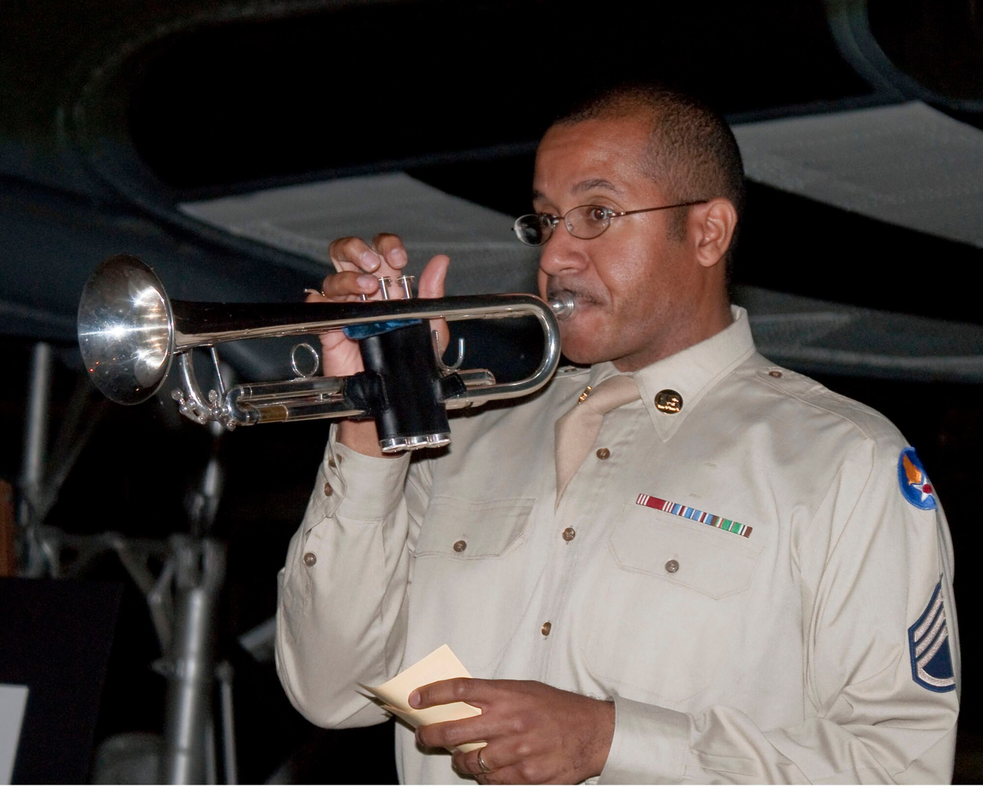 A Glenn Miller band member plays his trumpet during Night at the Air Force Museum on May 15 at the National Museum of the U.S. Air Force at Dayton, Ohio. (U.S. Air Force photo/Dick Brice) 
