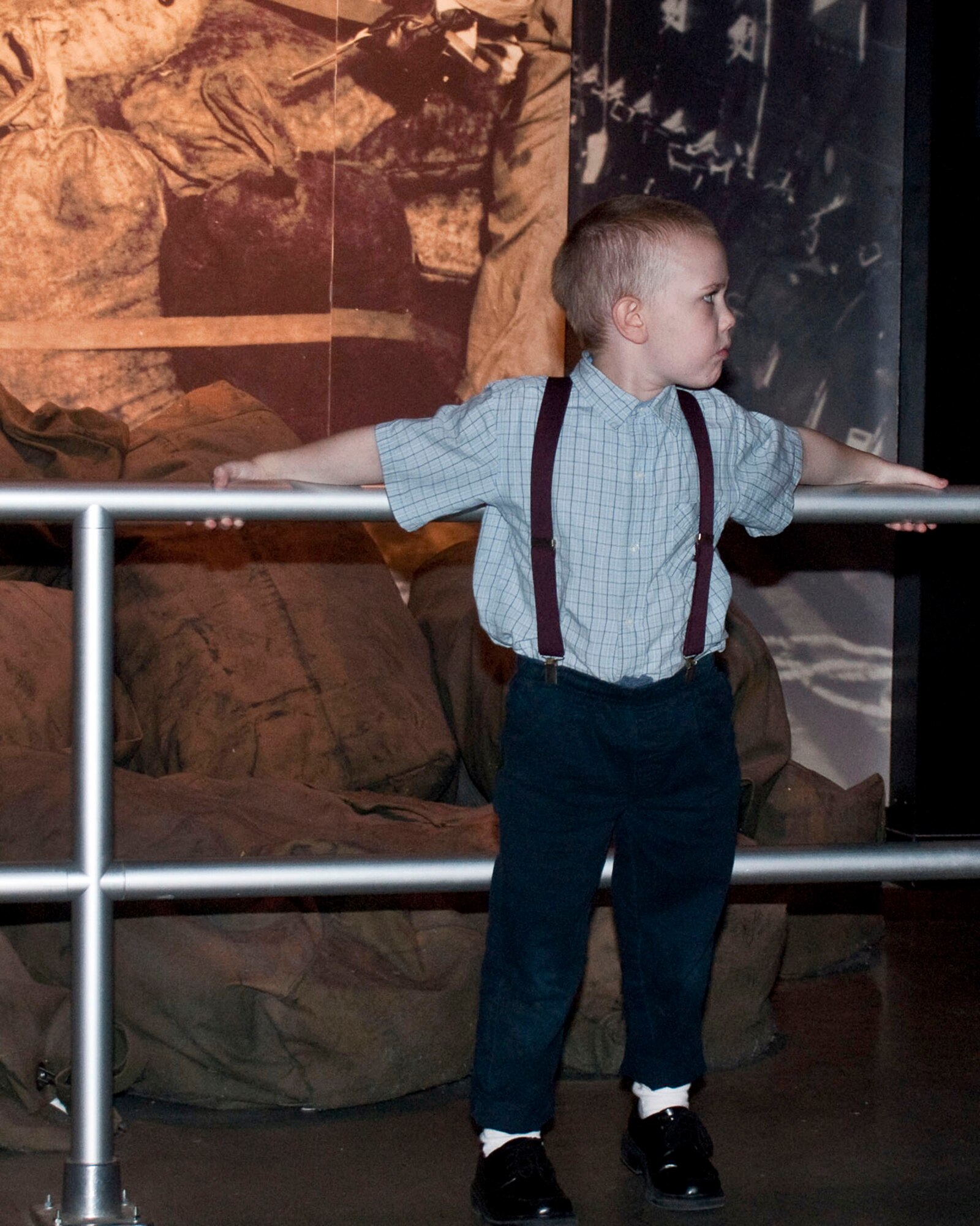 One actor waits for the "Candy Bomber" to drop some candy in the Berlin Airlift exhibit during Night at the Air Force Museum on May 15 at the National Museum of the U.S. Air Force ind Dayton, Ohio. (U.S. Air Force photo/Dick Brice)
