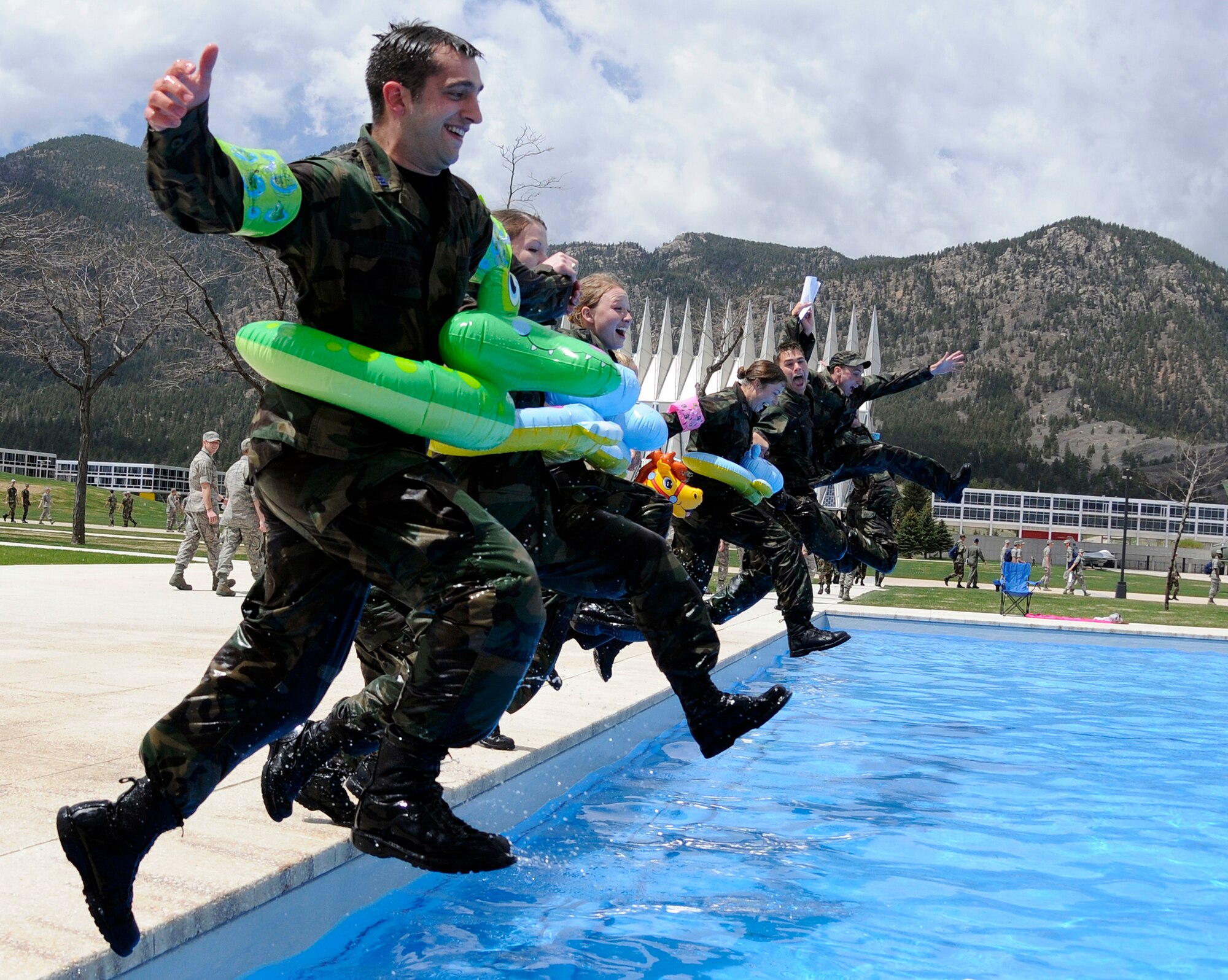 Class of 2009 cadets dive into a fountain in the cadet area May 8 to celebrate finishing their final exams. Graduation is scheduled for May 27 at Falcon Stadium. (U.S. Air Force photo/Mike Kaplan)