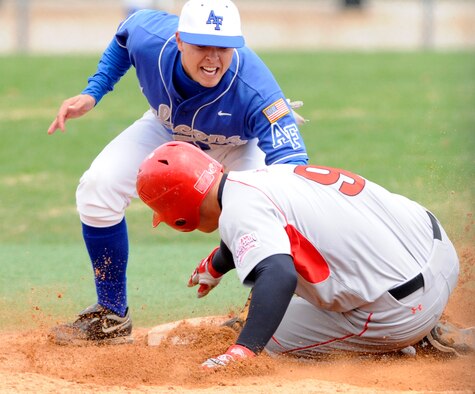 Air Force Falcons shortstop Adam Hill makes the tag on a Utah Utes player's attempt to steal a base. Air Force dropped a doubleheader to the Utes May 3, 12-6 and 19-8. (U.S. Air Force photo/J. Rachel Spencer)