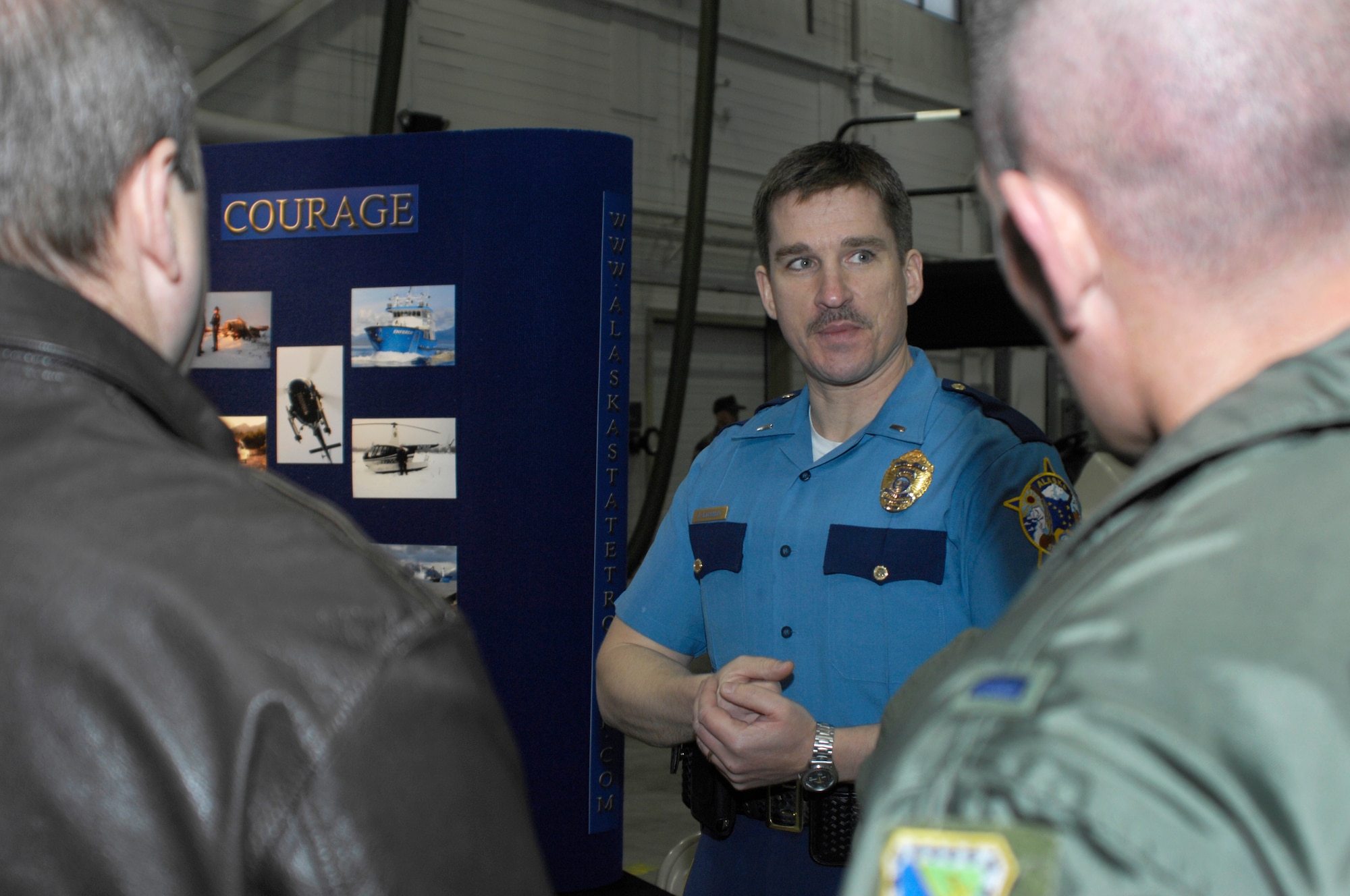 ELMENDORF AIR FORCE BASE, Alaska -- Alaska State Trooper Lt. Jeffrey Laughlin speaks to Arctic Warriors about driving conditions on Alaska highways during the wing Safety Day May 15. Laughlin spoke to 3rd Wing Airmen about vehicle safety during the summer months in Alaska. (U.S. Air Force photo/Senior Airman David Carbajal)