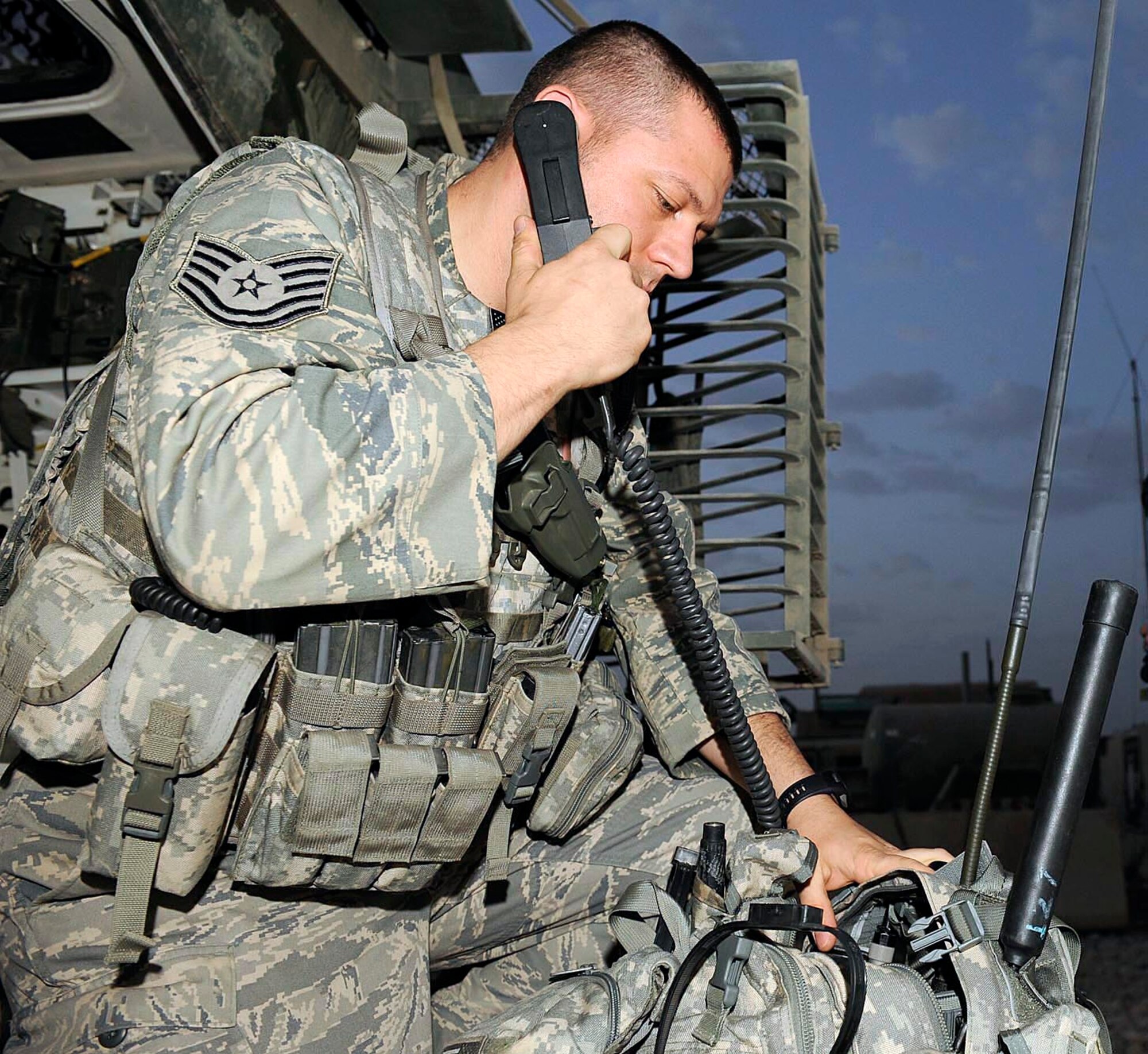 Tech. Sgt. Ben Jenkins conducts a radio check to make sure the portable radio is working before going out on a mission from Camp Liberty, Iraq, May 13. Sergeant Jenkins is a part of the tactical air control party working to ensure the Soldiers on the ground have the air support they need to get their mission done. Sergeant Jenkins is an 82nd Expeditionary Air Support Operations Squadron tactical command and control specialist. (U.S. Air Force photo/Senior Airman Jacqueline Romero)