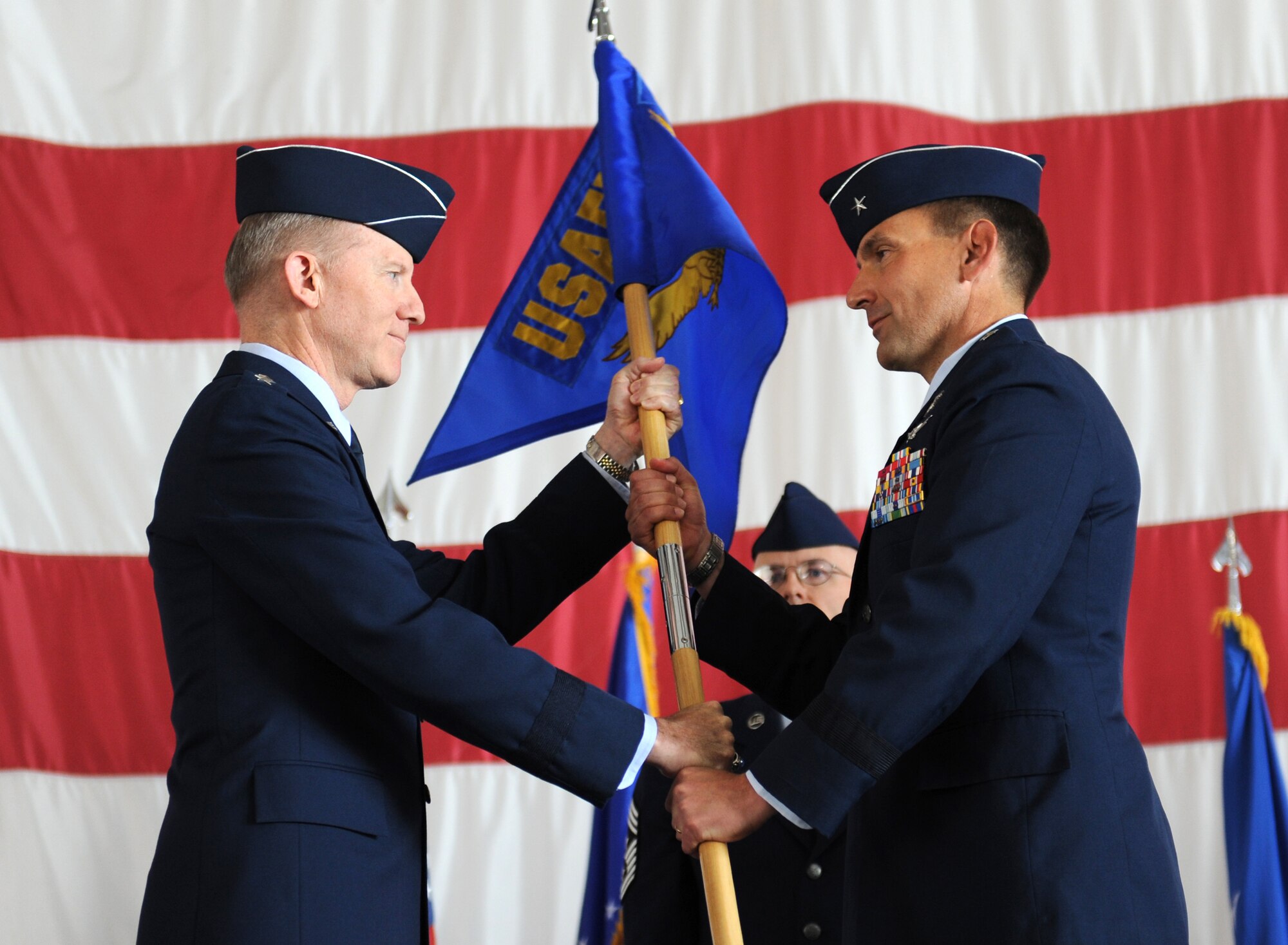 Gen. John D.W. Corley (left), Commander, Air Combat Command, Langley Air Force Base, Va., pass the gideon to Brig. Gen. Stanley T. Kresge, Commander, U.S. Air Force Warfare Center during the USAFWC change of command ceremony at Nellis AFB, Nev., May 18. Brig. Gen. Kresge assumes command of the USAFWC after being the Director of Air, Space and Nuclear Operations, Headquarters Air Force Space Command at Peterson AFB, Colo.
(U.S. Air Force Photo/Senior Airman Larry E. Reid Jr.)