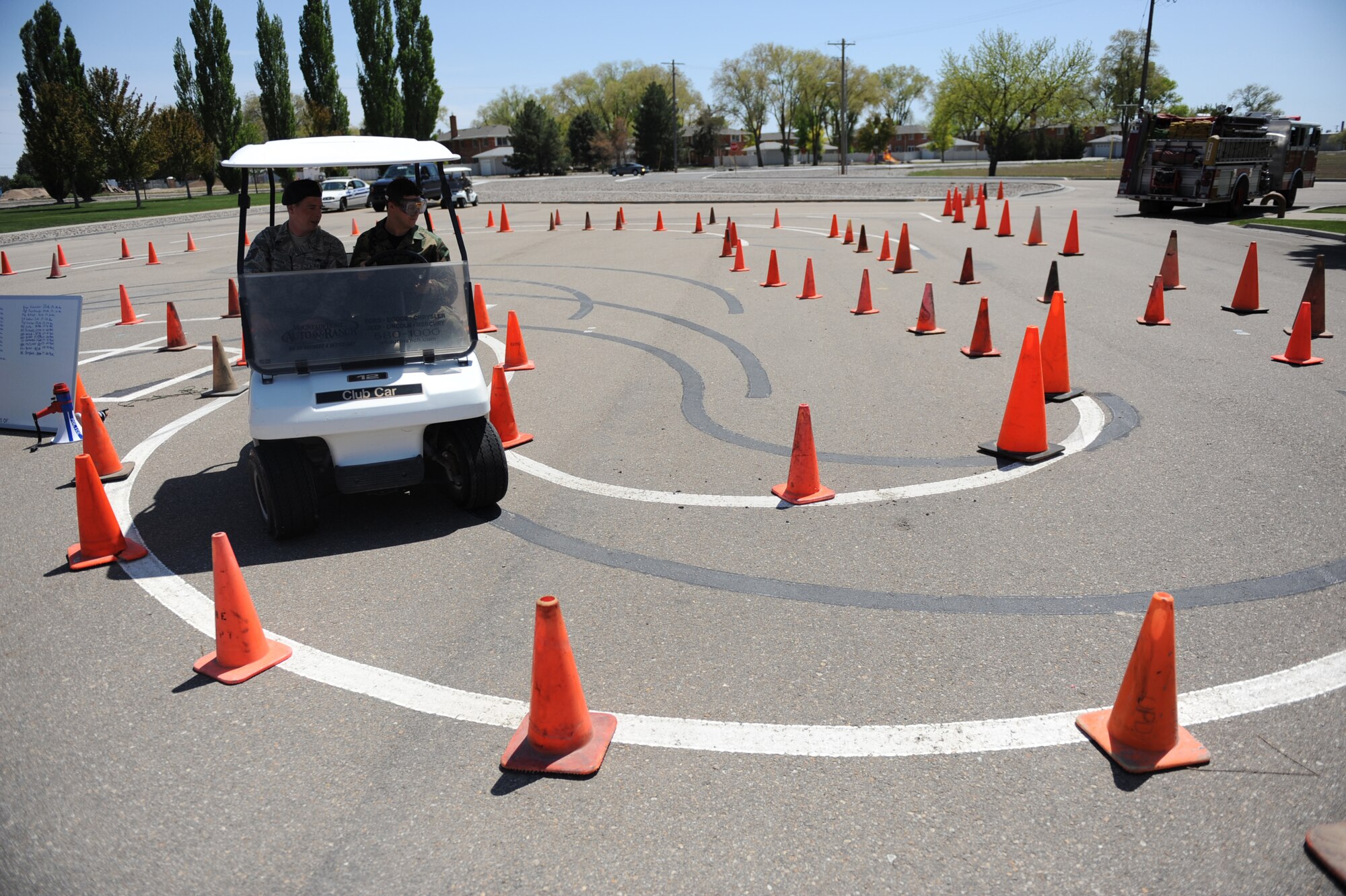 MOUNTAIN HOME AIR FORCE BASE, Idaho -- The 366th Security Forces Squadron hosts a drunk driving simulator May 15 where participants wear vision-impairing goggles to mimic the effects of alcohol while they try to navigate the obstacle course. The base hosts a wing safety day once a year to educate people on proper safety techniques and to kick off the “101 Critical Days of Summer,” which runs from Memorial Day to Labor Day. (U.S. Air Force photo/ Senior Airman Ryan Crane)
