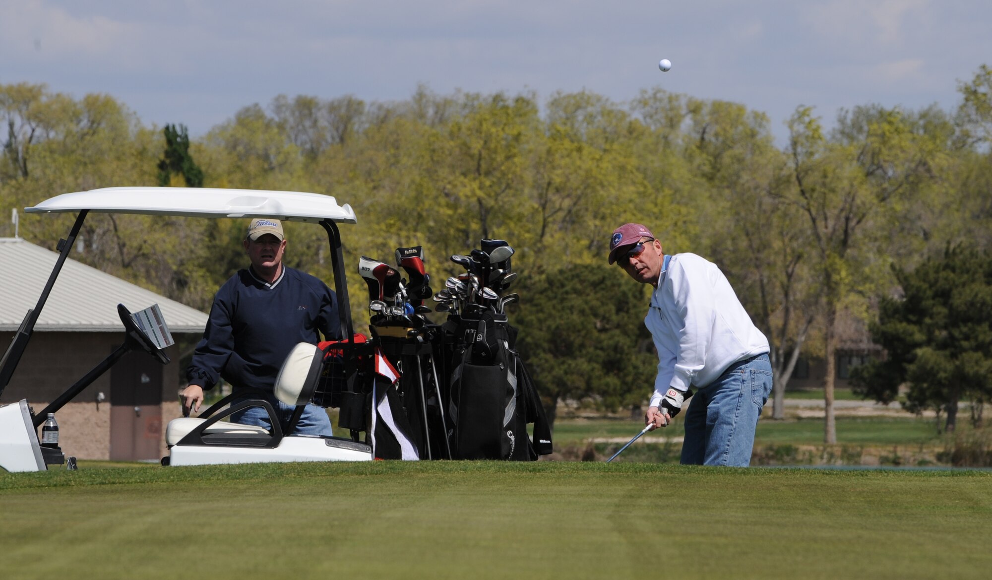 MOUNTAIN HOME AIR FORCE BASE, Idaho -- Master Sgt. Jeffery Waters, 366th Component Maintenance Squadron first sergeant, chips the ball onto the green during the Golf Scramble May 12 in appreciation of National Police Week. The week honors personnel in law enforcement and pay tribute to those who gave their lives while serving their community.  (U.S. Air Force photo/ Airman 1st Class Renishia Richardson)