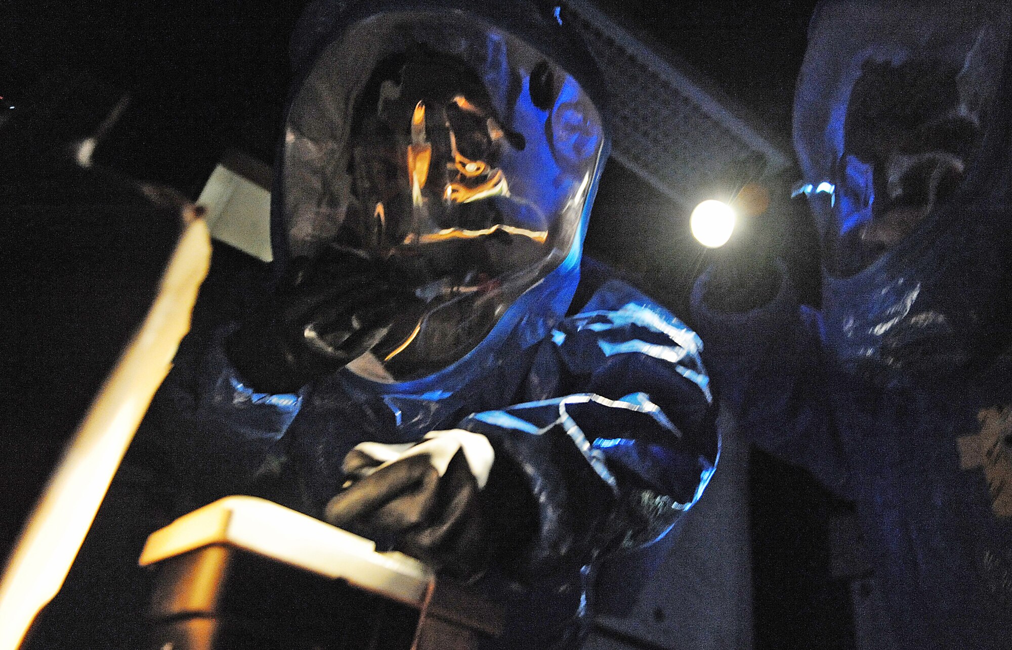 MOUNTAIN HOME AIR FORCE BASE, Idaho -- Tech. Sgt. Kiley Davis and Airman 1st Class Todd Kolva, 366th Aerospace Medicine Squadron bioenvironmental engineer technician, scan a suspicious package for chemical and radiological contaminants May 12. The bioenvironmental engineer flight is participating in the Air Combat Command chemical, biological, radiological, nuclear and high yield explosive (CBRNE) challenge, which consists of several scenarios they may encounter such as a suspicious package or chemical spill. The team will compete against other ACC bases and could then move on to compete at the Air Force level. (U.S. Air Force photo/ Senior Airman Ryan Crane)
