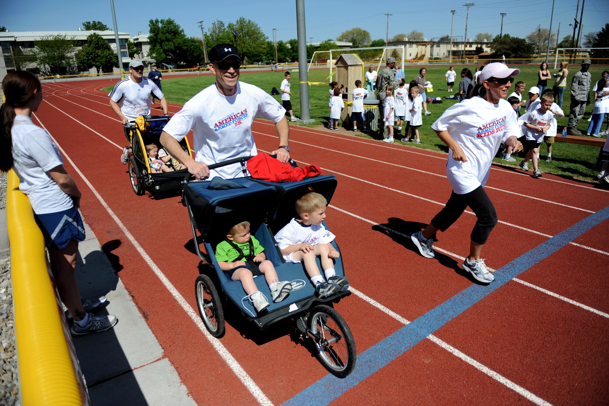 MOUNTAIN HOME AIR FORCE BASE, Idaho -- Maj. James Beaty, 366th Services Squadron commander, runs two miles during the America’s Armed Forces Kids Run May 15. Held in conjunction with Armed Forces Day, the run is geared for children ages five and up, including adults, to promote a more active lifestyle. (U.S. Air Force photo/ Senior Airman Ryan Crane)