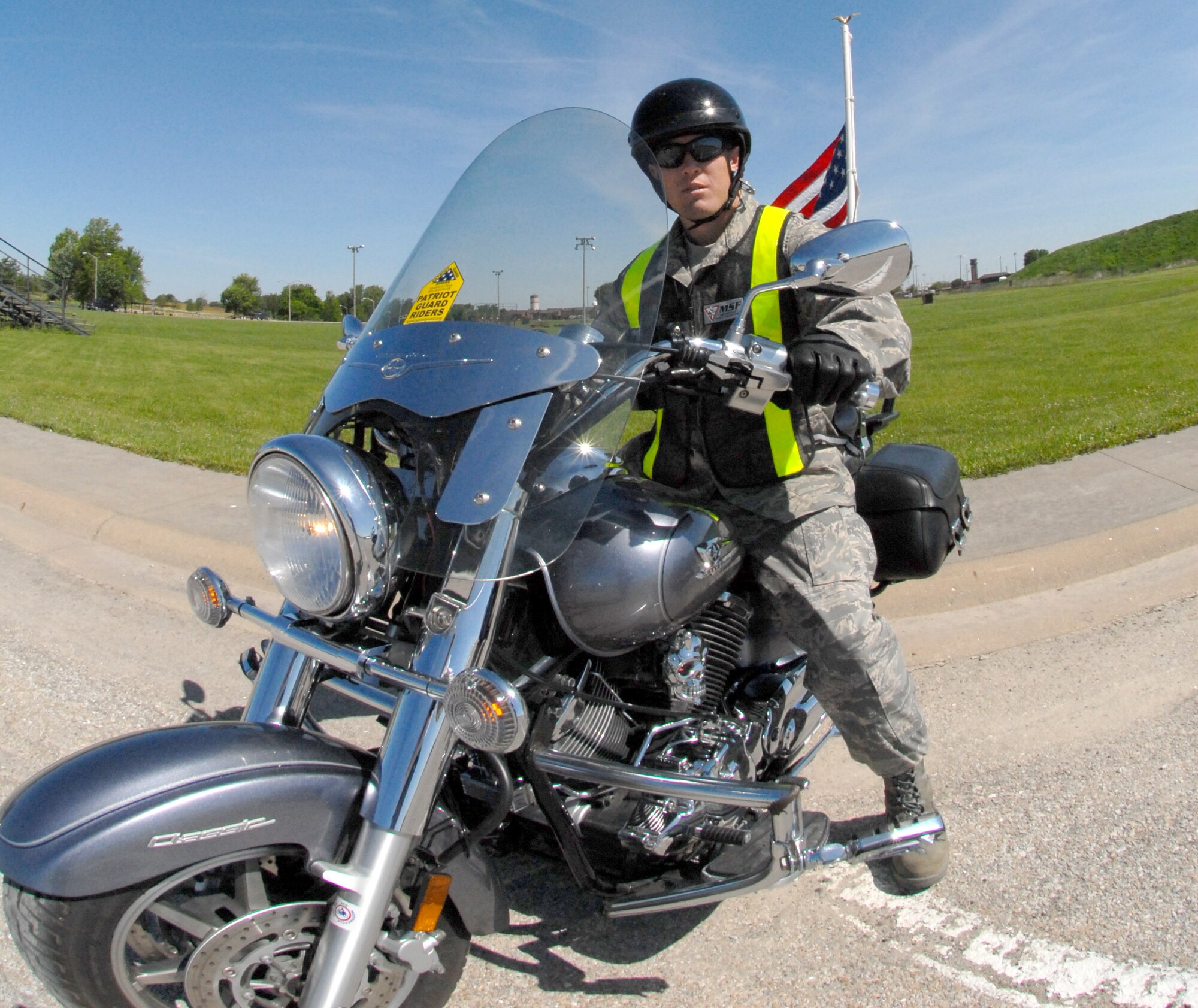 Master Sgt. Justin Johnston gets ready for a group motorcycle ride around Whiteman Air Force Base, Mo., as part of Safety Day at Whiteman May 18, 2009.  Sergeant Johnston is an Air Force Reservist in the 442nd Fighter Wing's safety office.  (U.S. Air Force photo/Master Sgt. Bill Huntington)